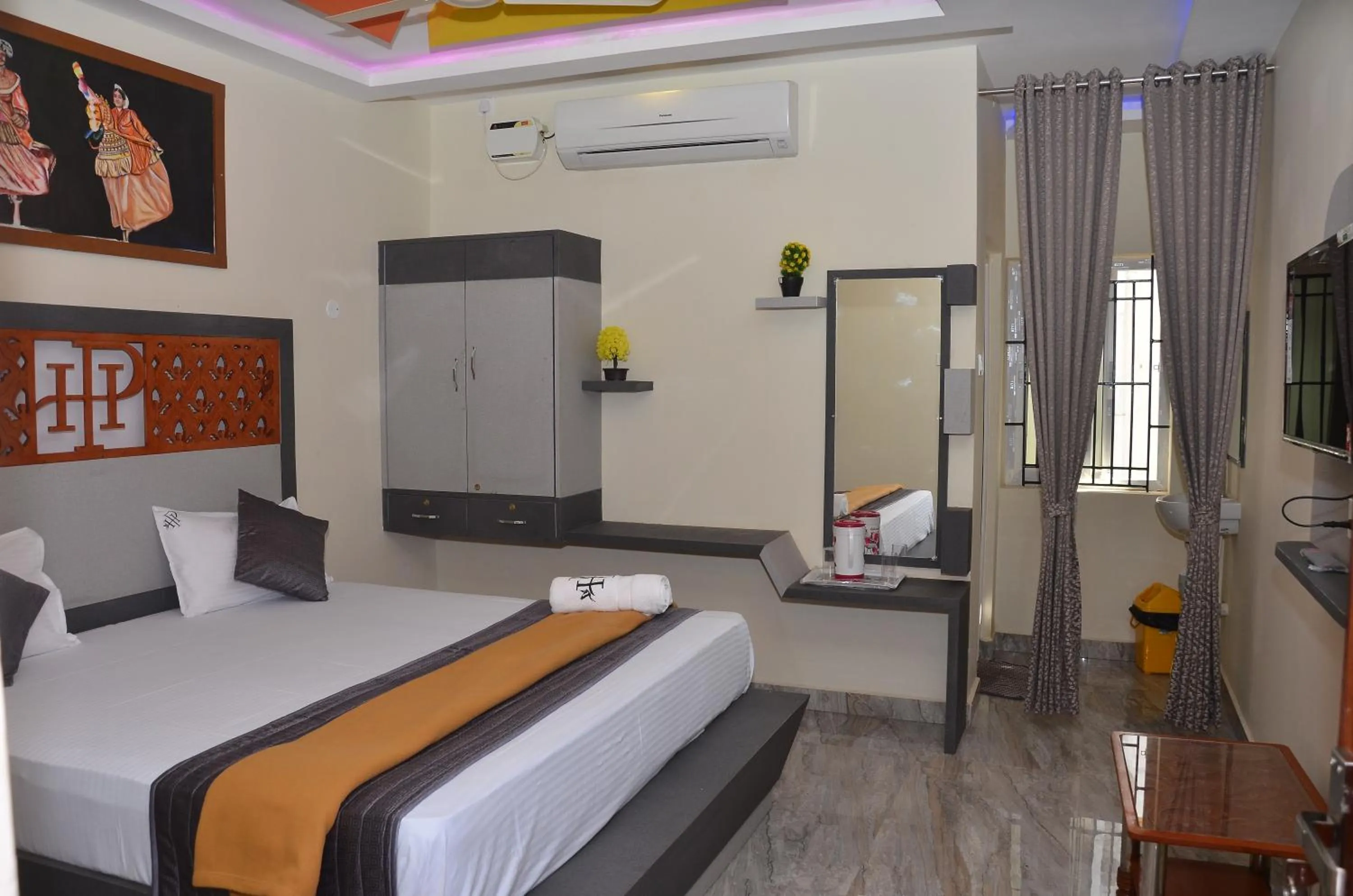 Bed in HOTEL PANCHAVARNAA