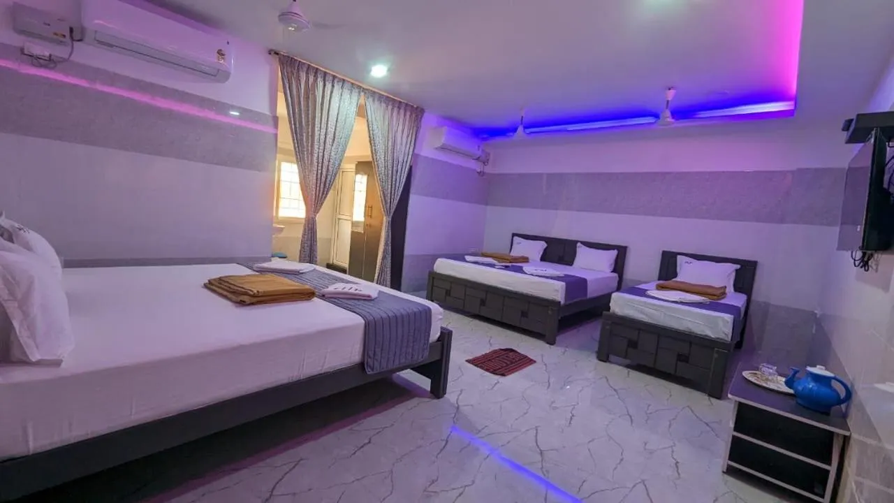 Bed in HOTEL PANCHAVARNAA