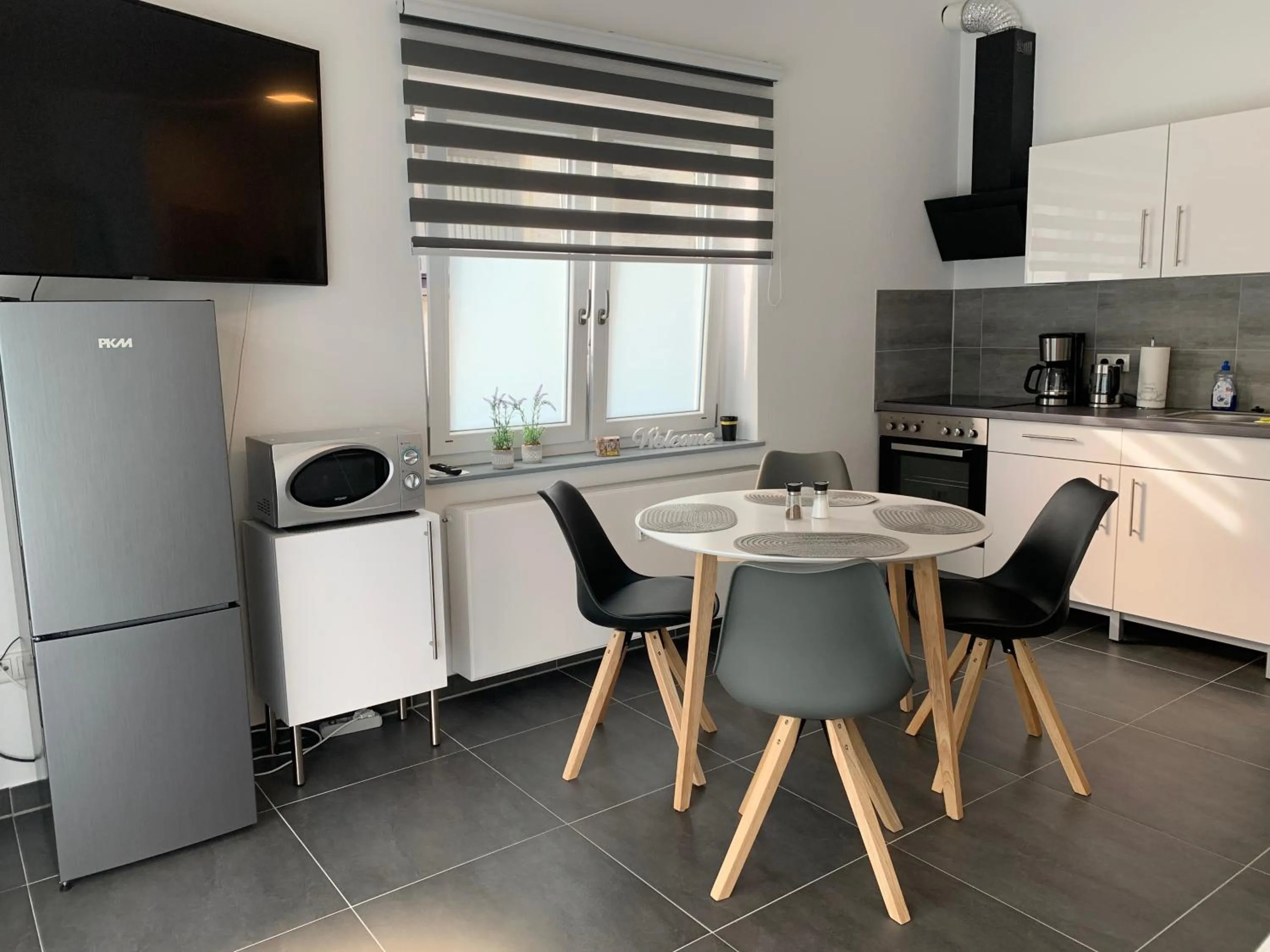 Dining area in H&E Apartments Barntrup