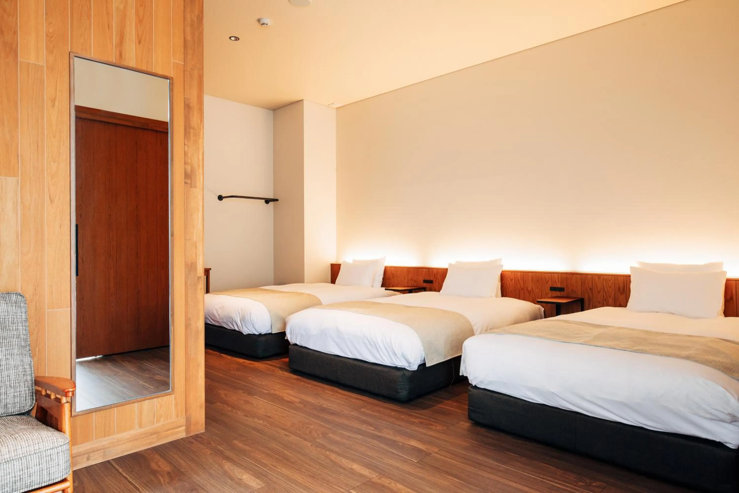 Bed in HOTEL KARUIZAWA CROSS