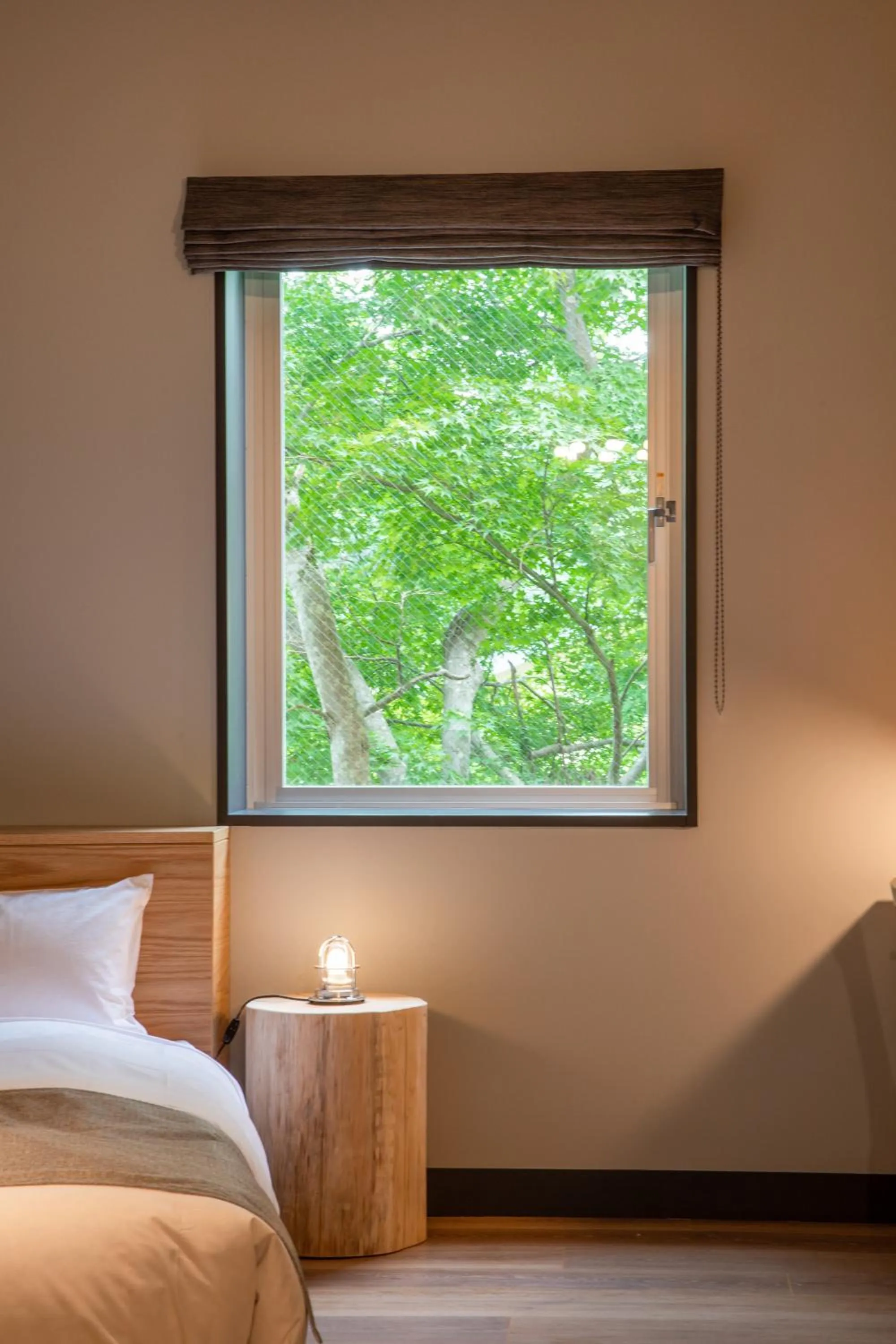 Bed in HOTEL KARUIZAWA CROSS