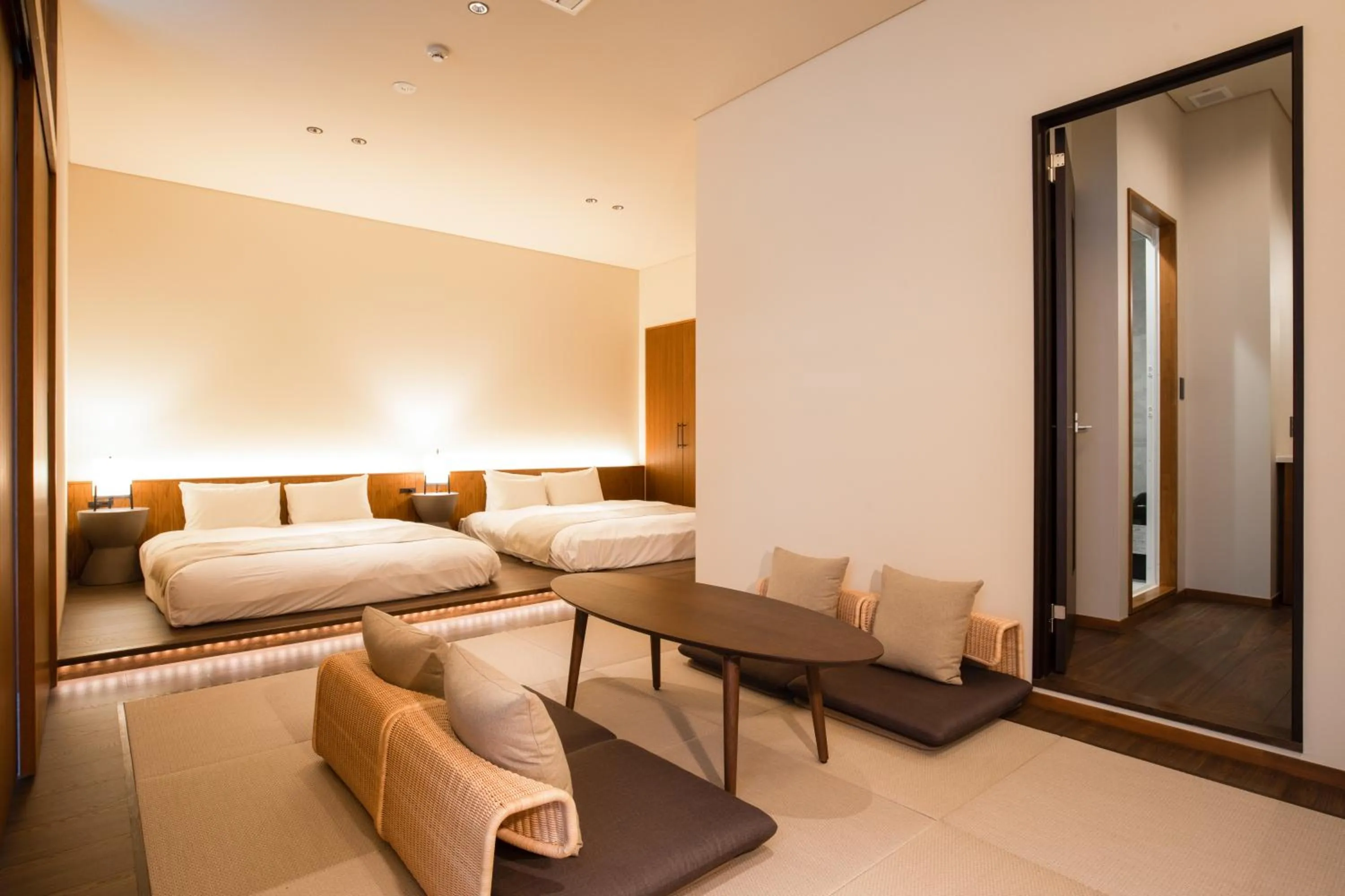 Bed in HOTEL KARUIZAWA CROSS