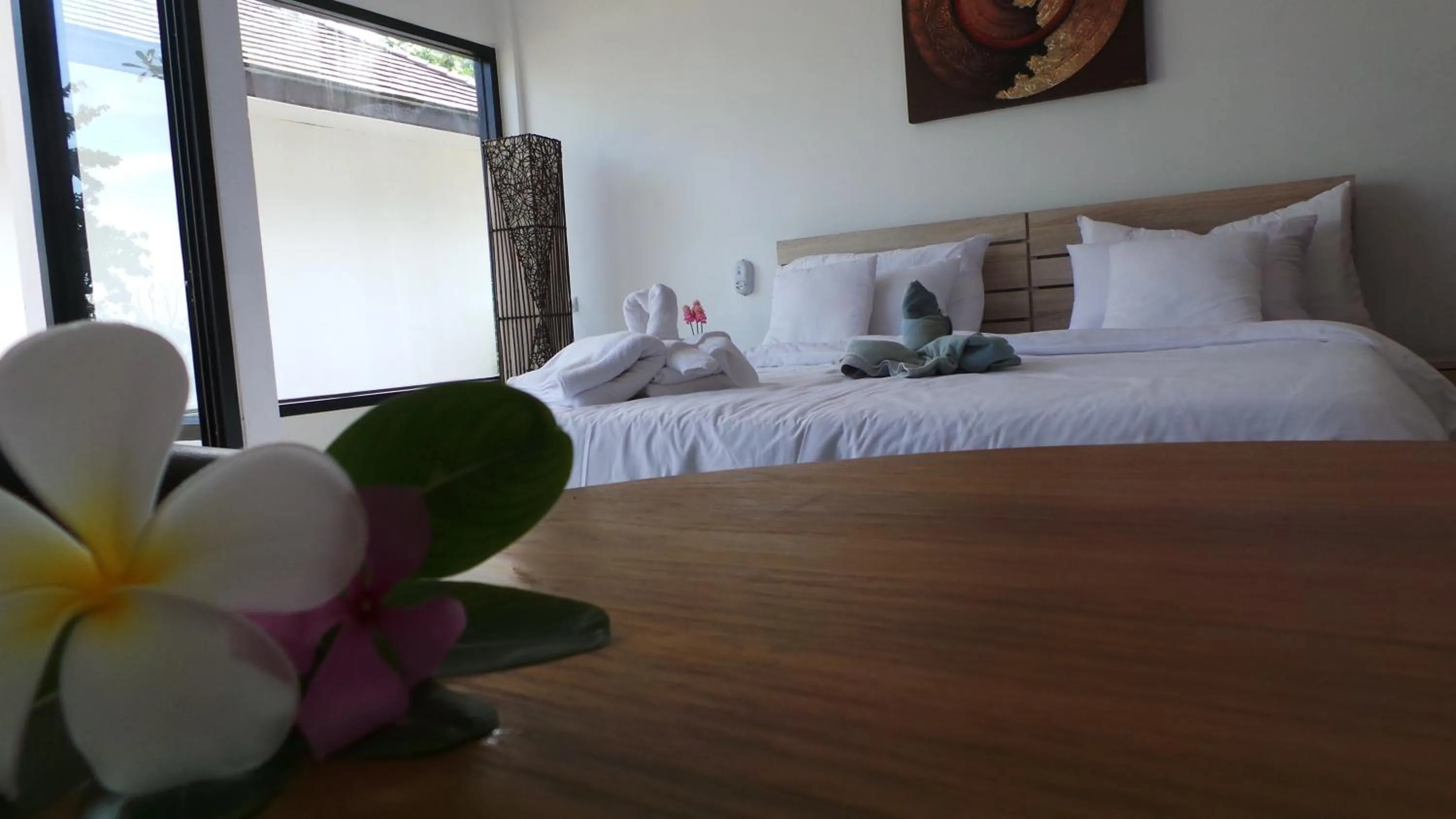 Bed in The Reef Resort