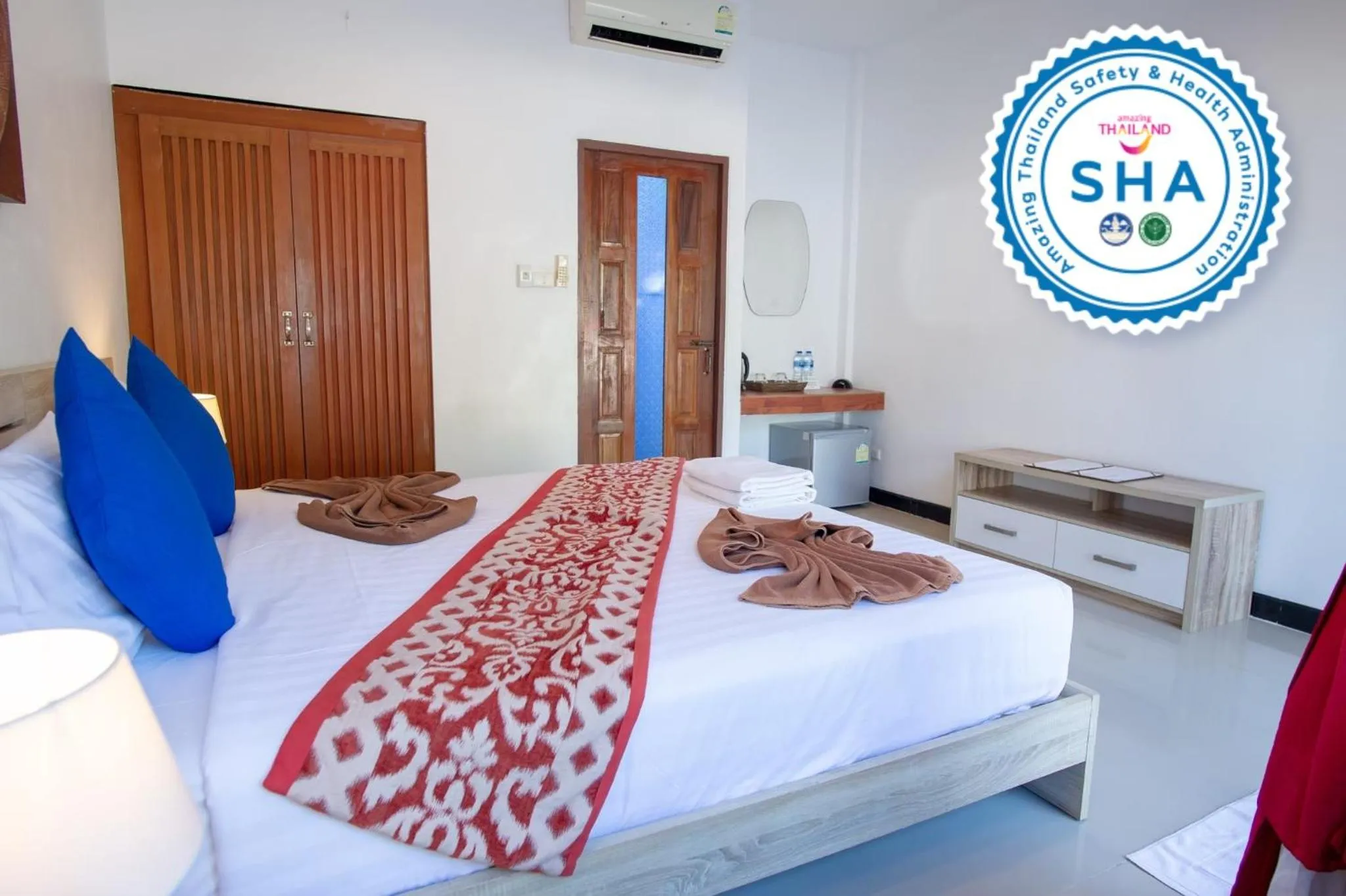 Bed in The Reef Resort