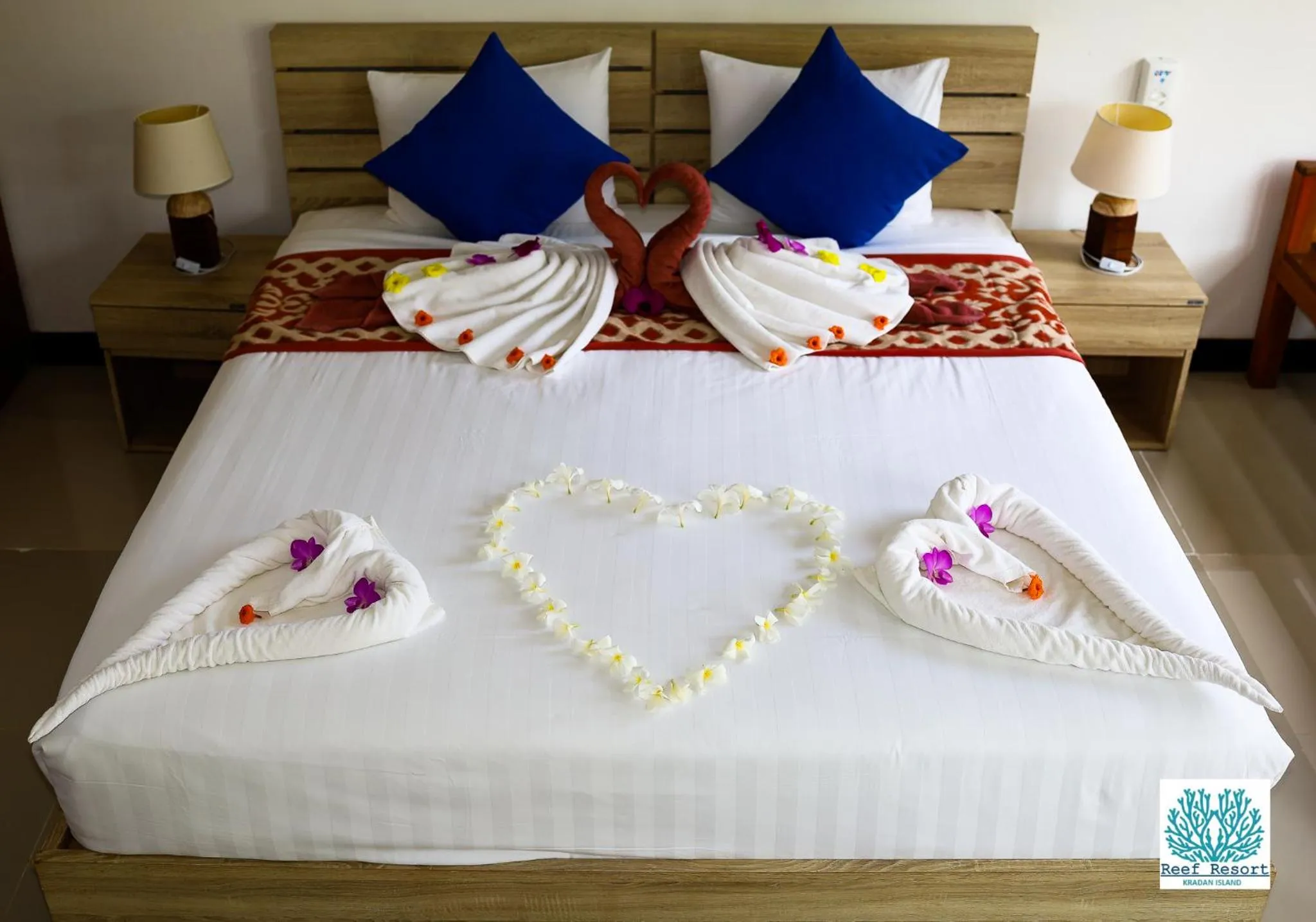 Bed in The Reef Resort