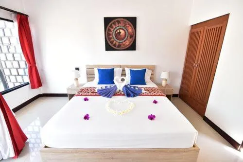 Bed in The Reef Resort