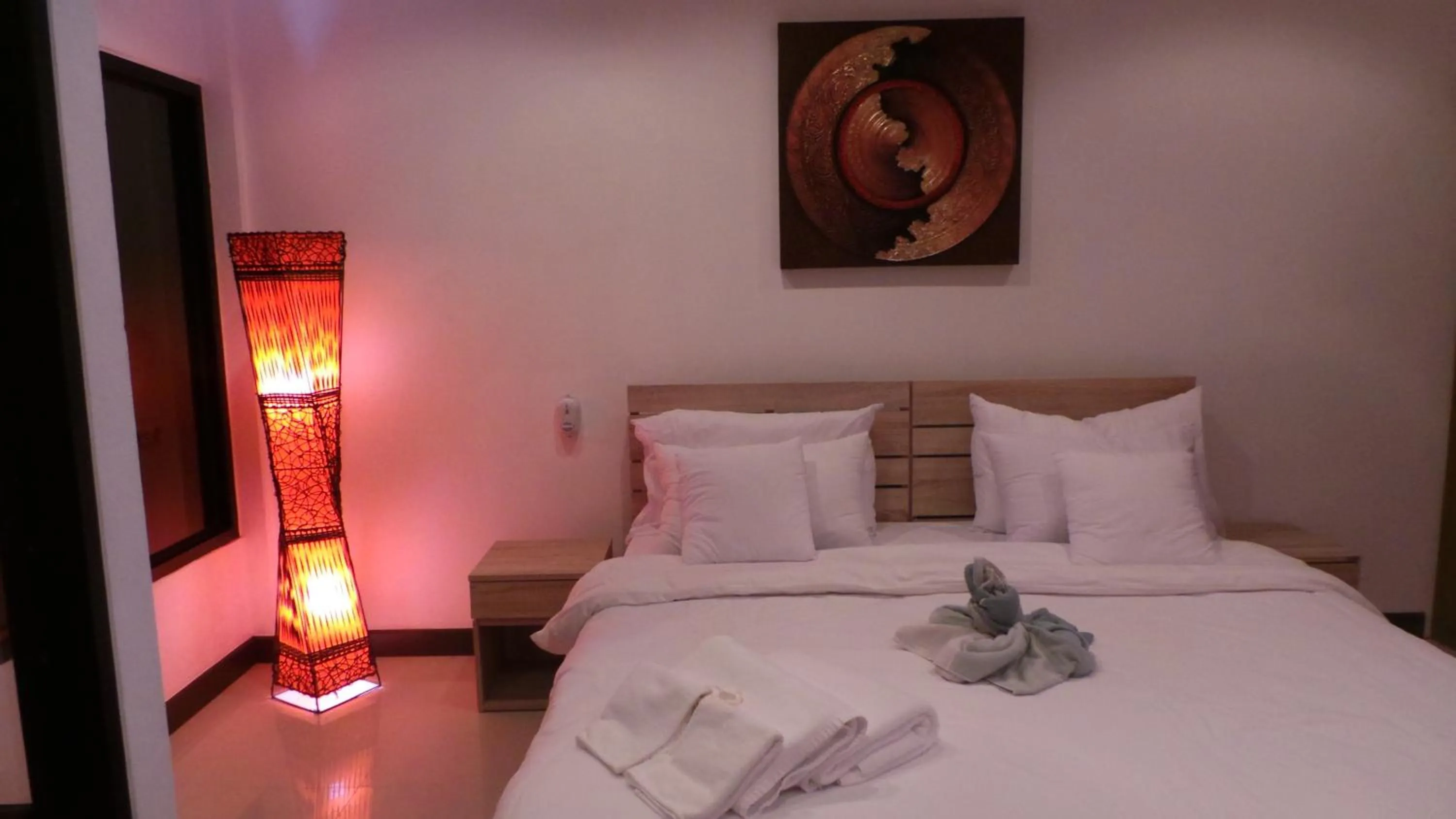 Bed in The Reef Resort