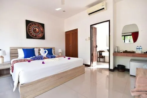 Bed in The Reef Resort