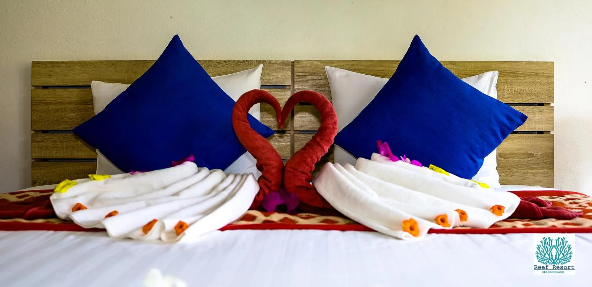 Bed in The Reef Resort