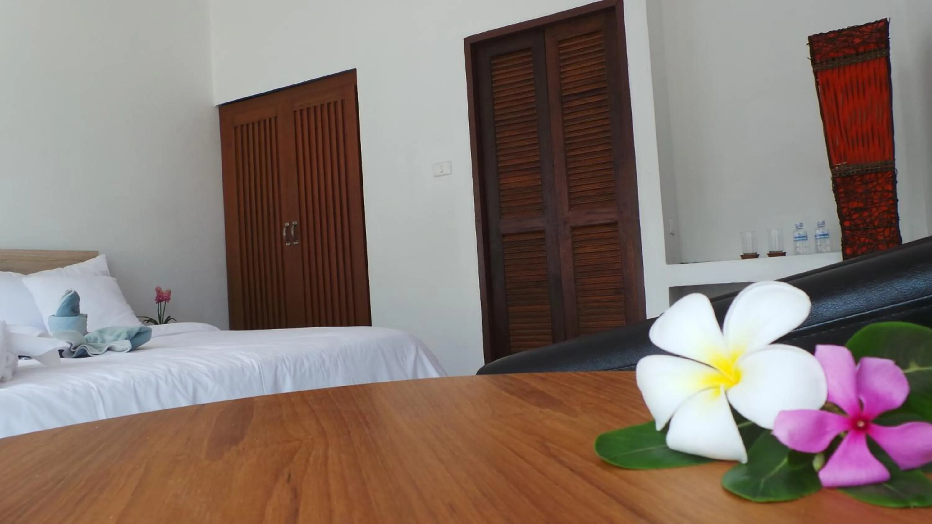 Bed in The Reef Resort