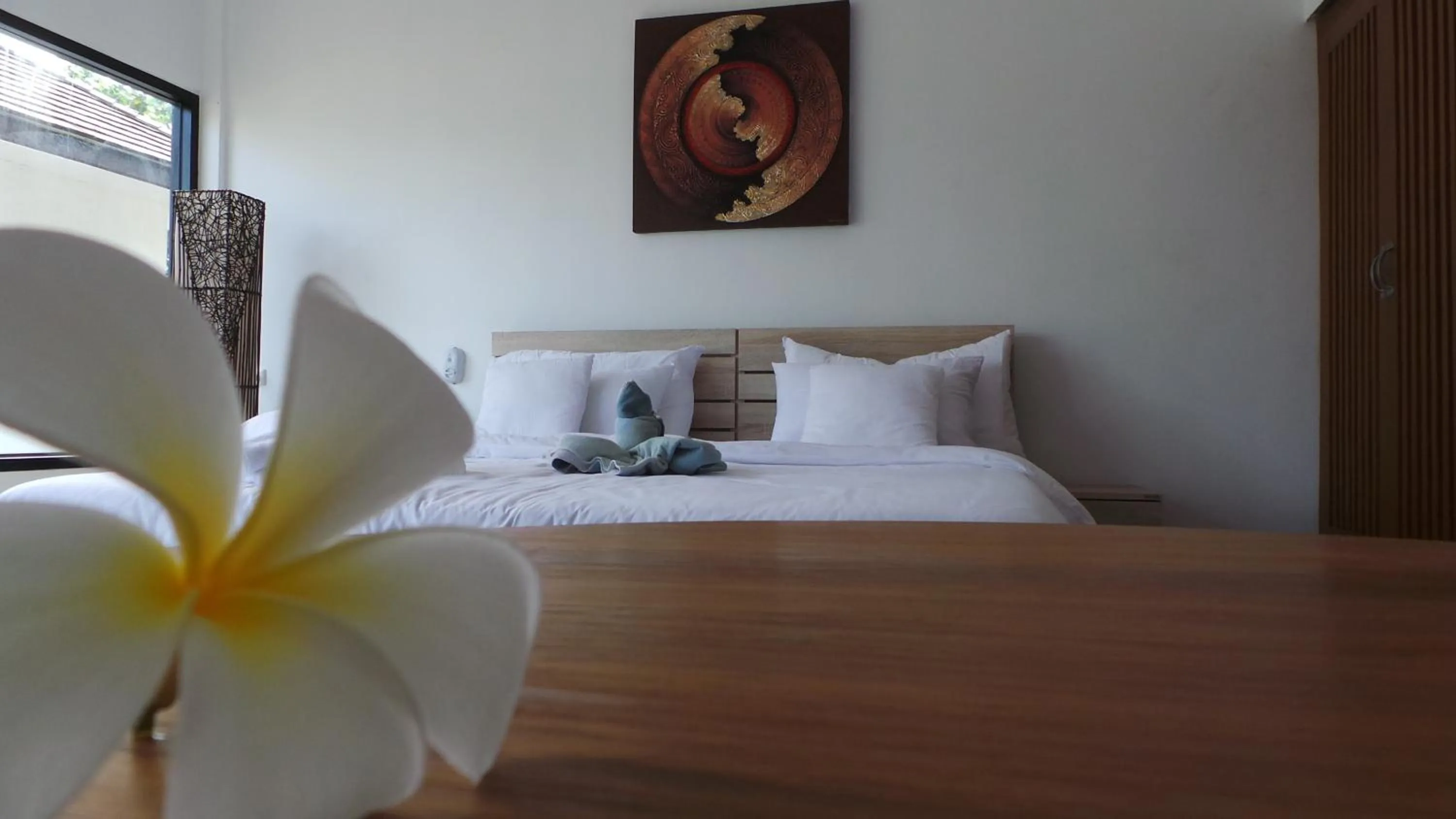 Bed in The Reef Resort