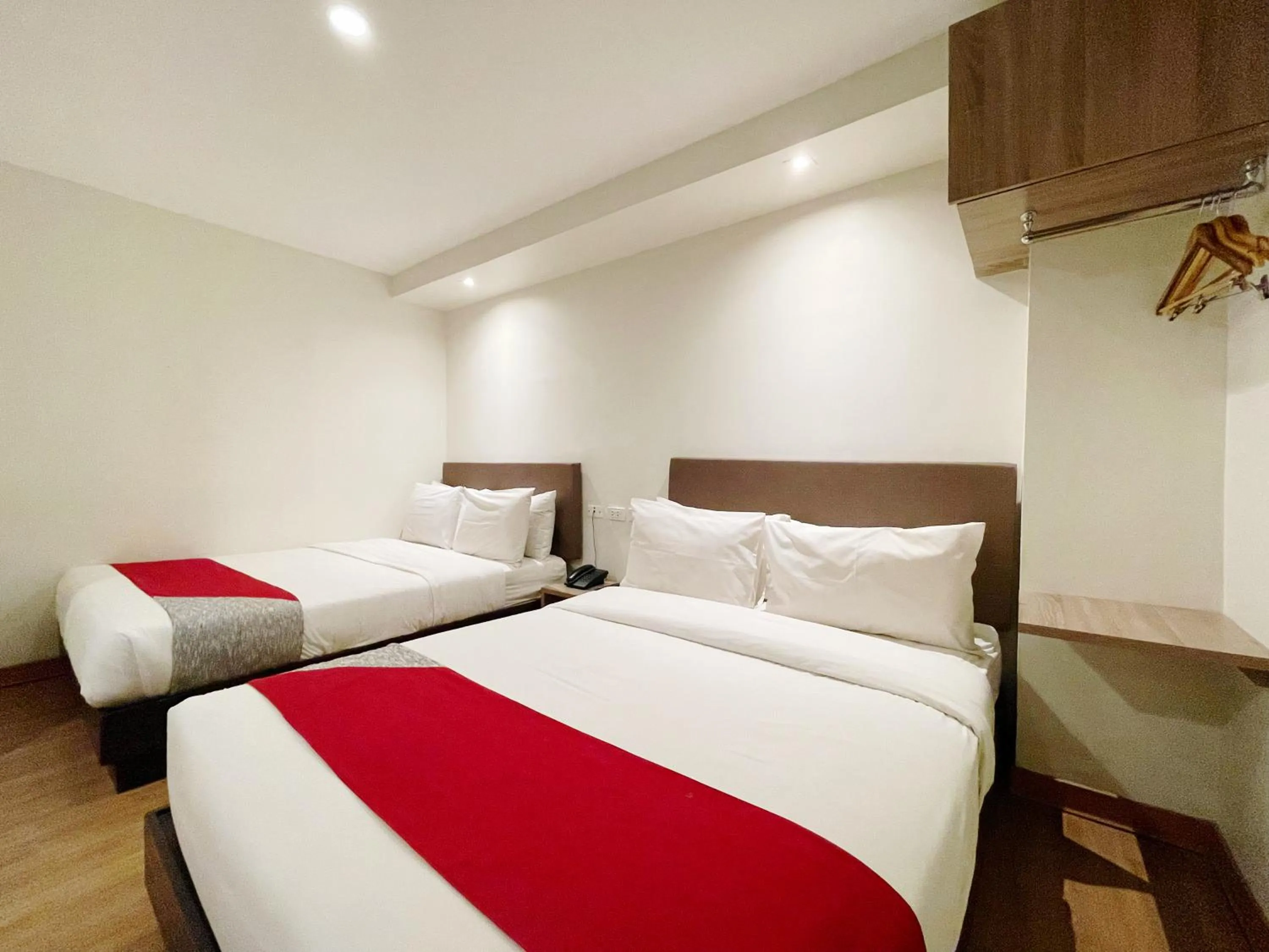 Bed in Airo Hotel Manila