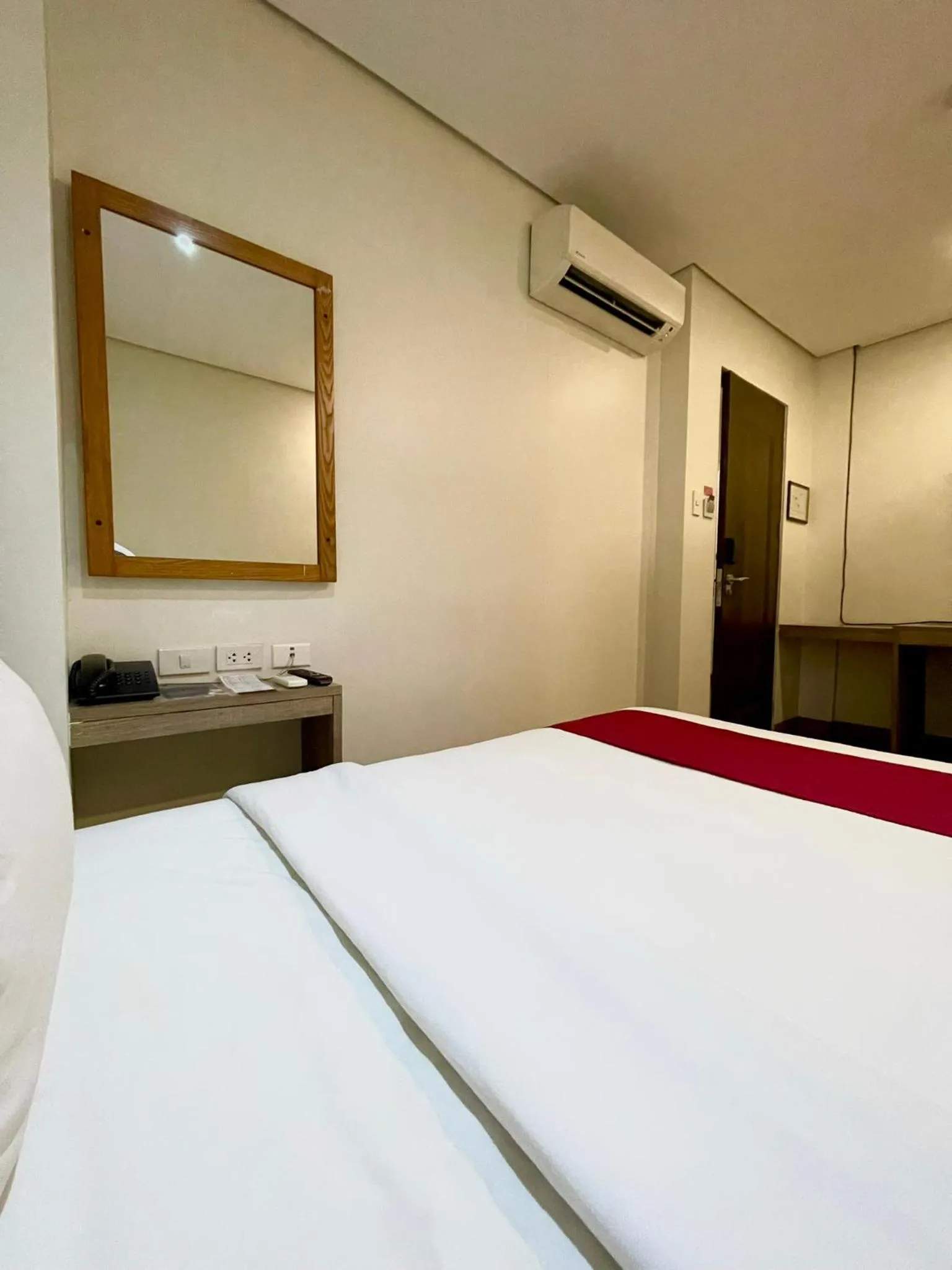 Bed in Airo Hotel Manila