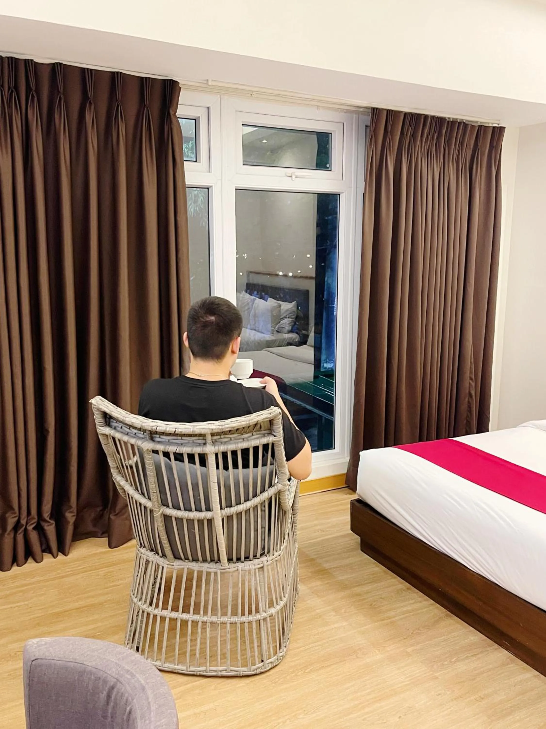 Seating area, Bed in Airo Hotel Manila