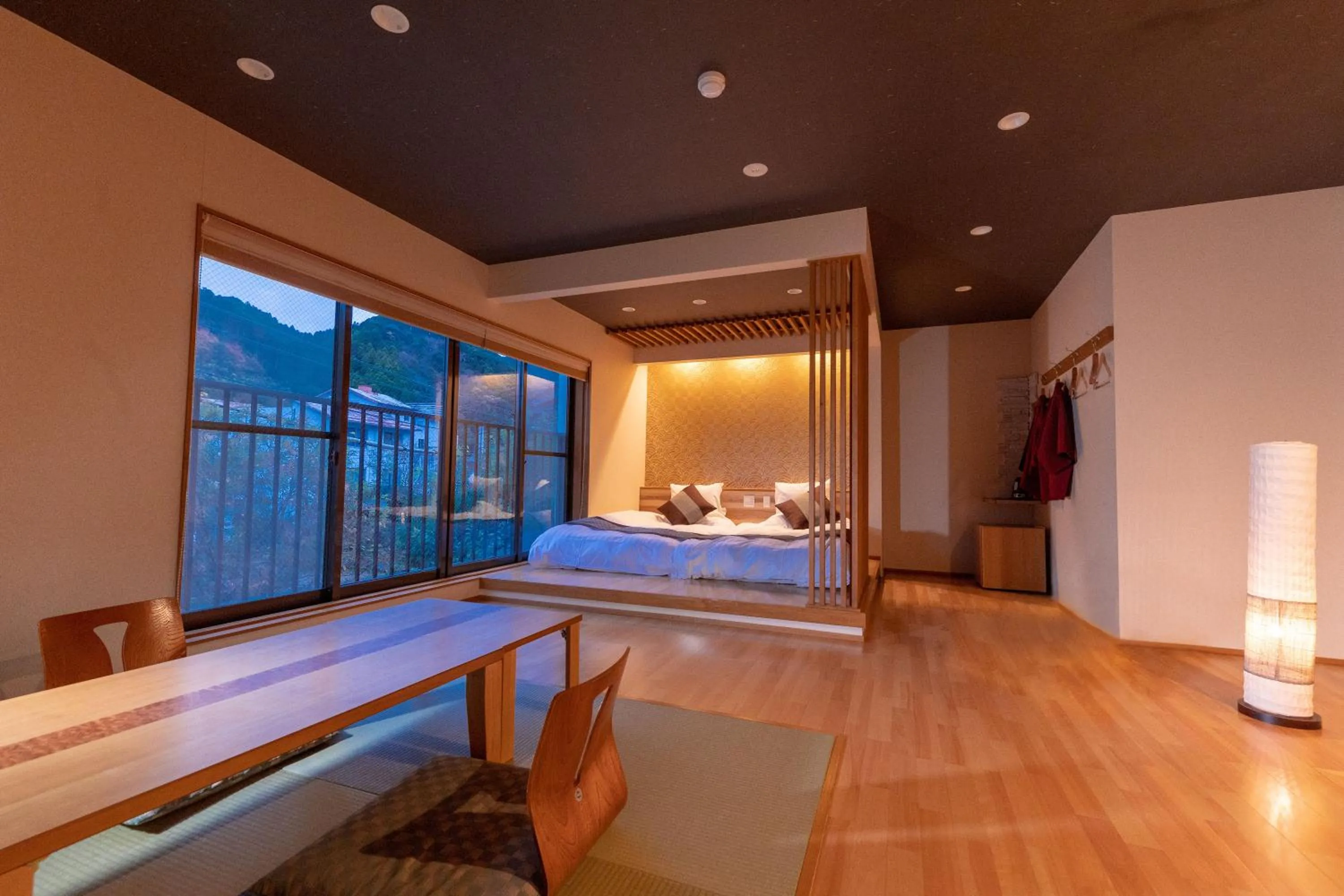 Living room, Bed in Tsukasa Ryokan