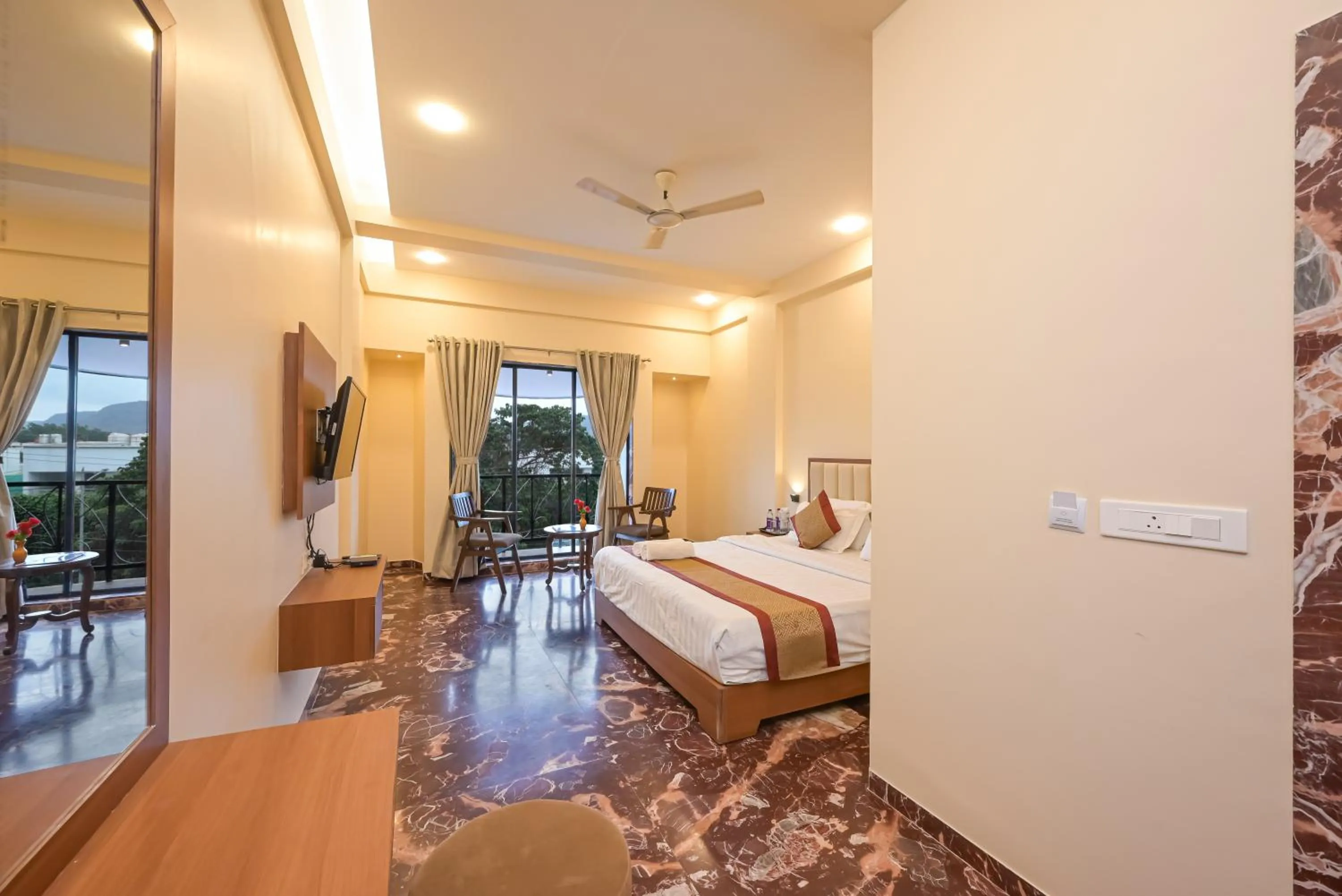 Bed in Hotel Aristro Lonavala