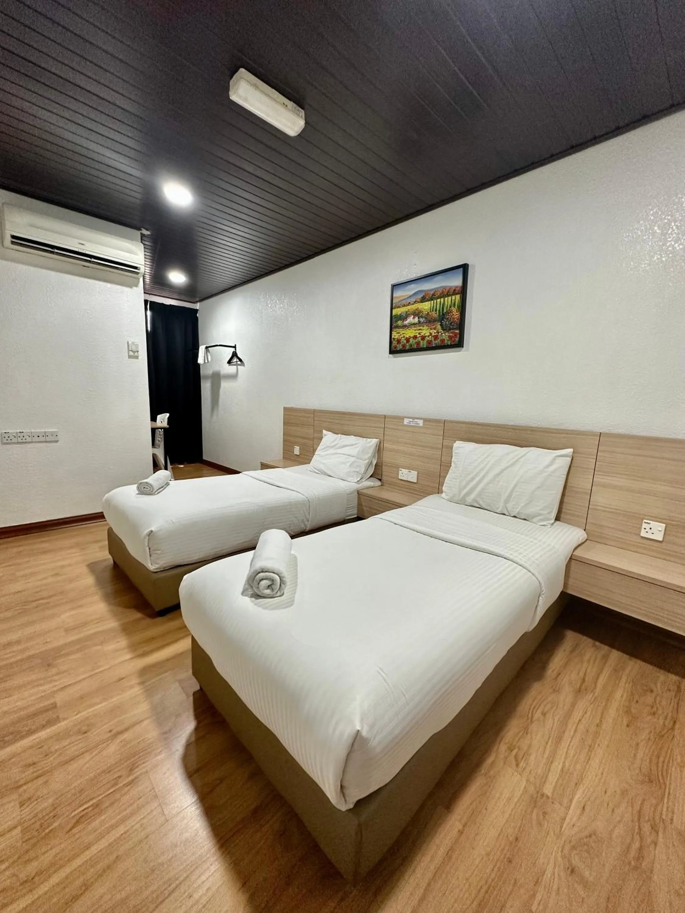 Bed in Kangar Hotel Sdn Bhd