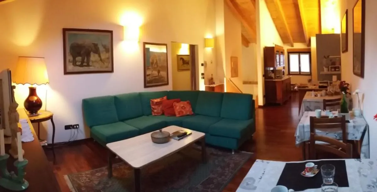 Communal lounge/ TV room in B&B Le Muse