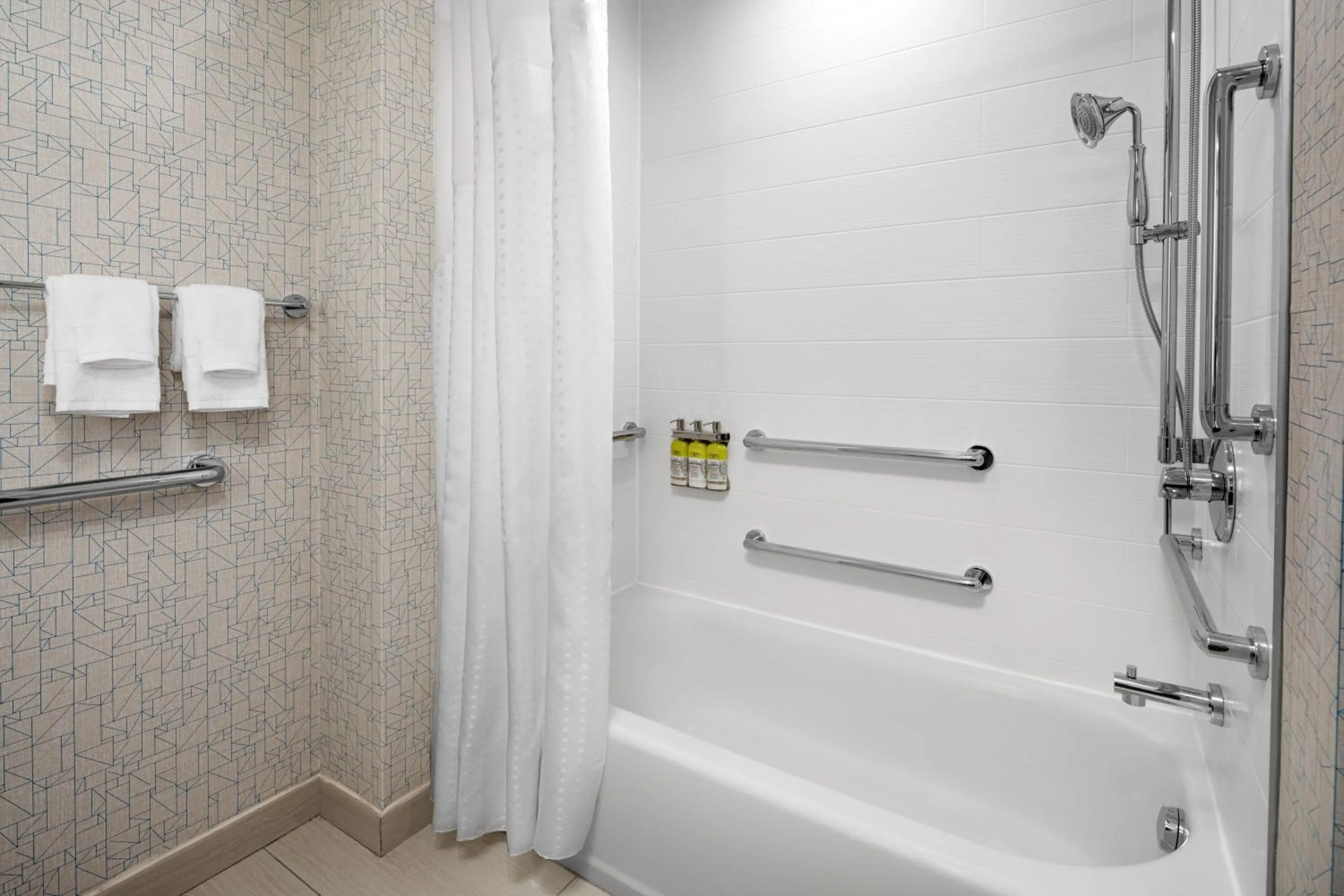 Toilet in Holiday Inn Express & Suites Woodside LaGuardia Airport