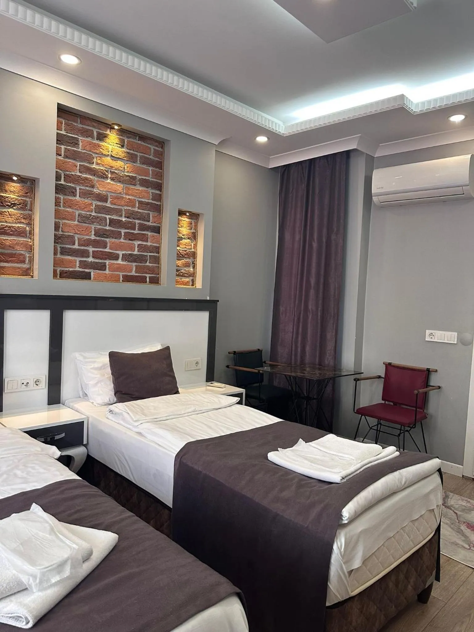 Bed in Gloria Suites Old City