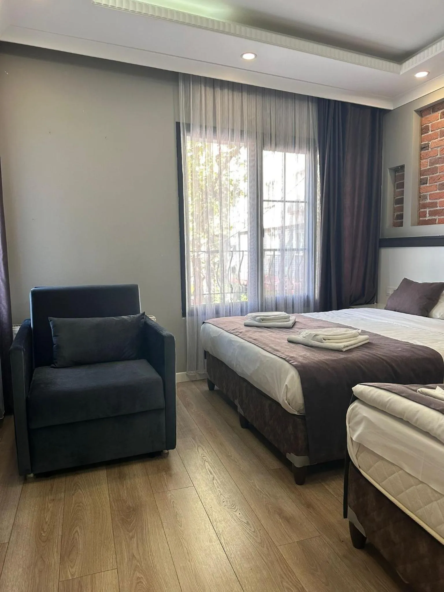 Bed in Gloria Suites Old City