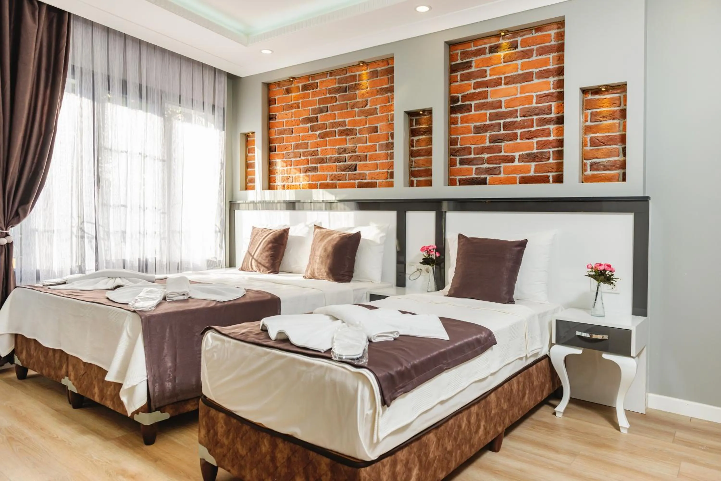 Bed in Gloria Suites Old City