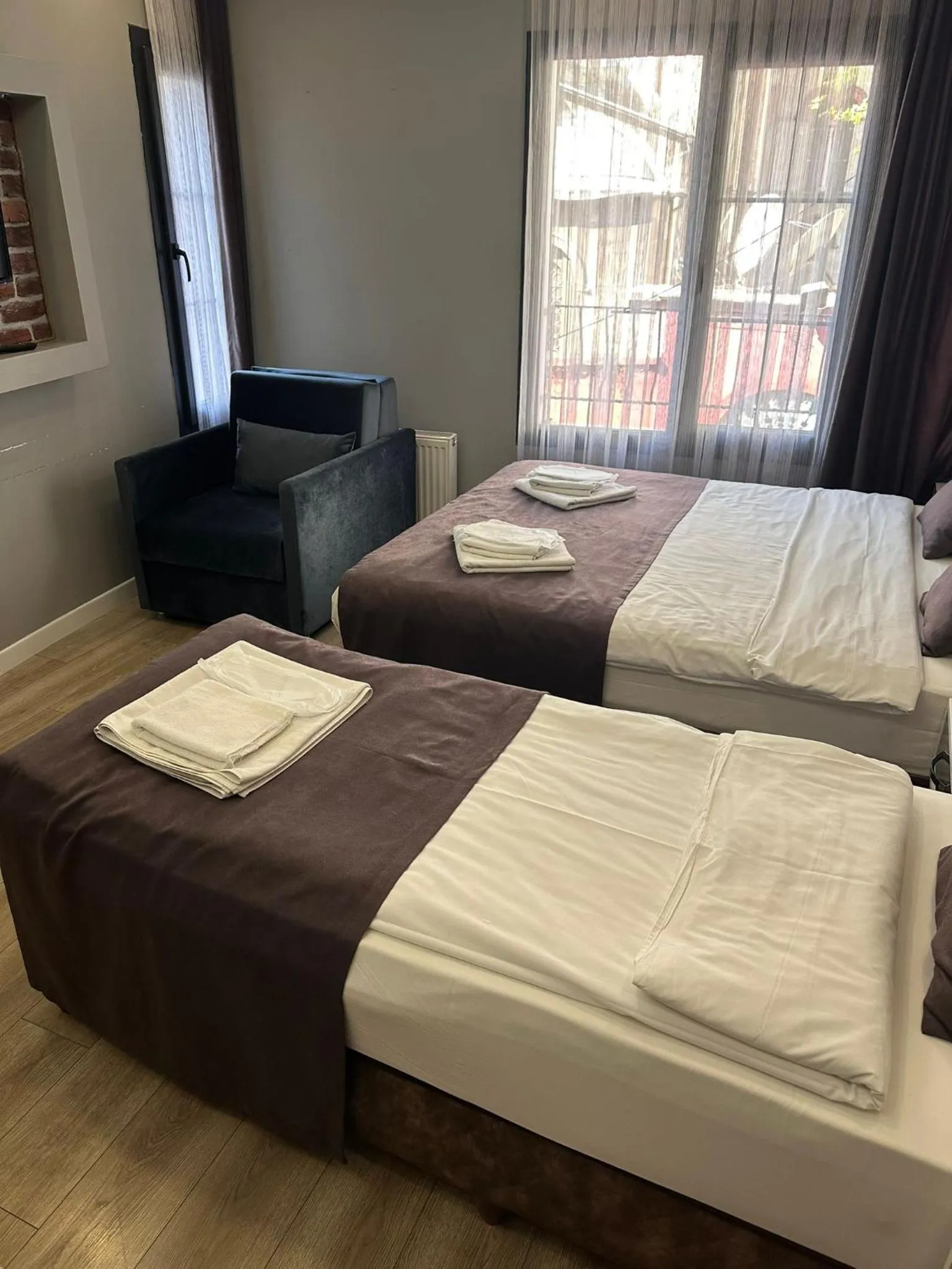 Bed in Gloria Suites Old City