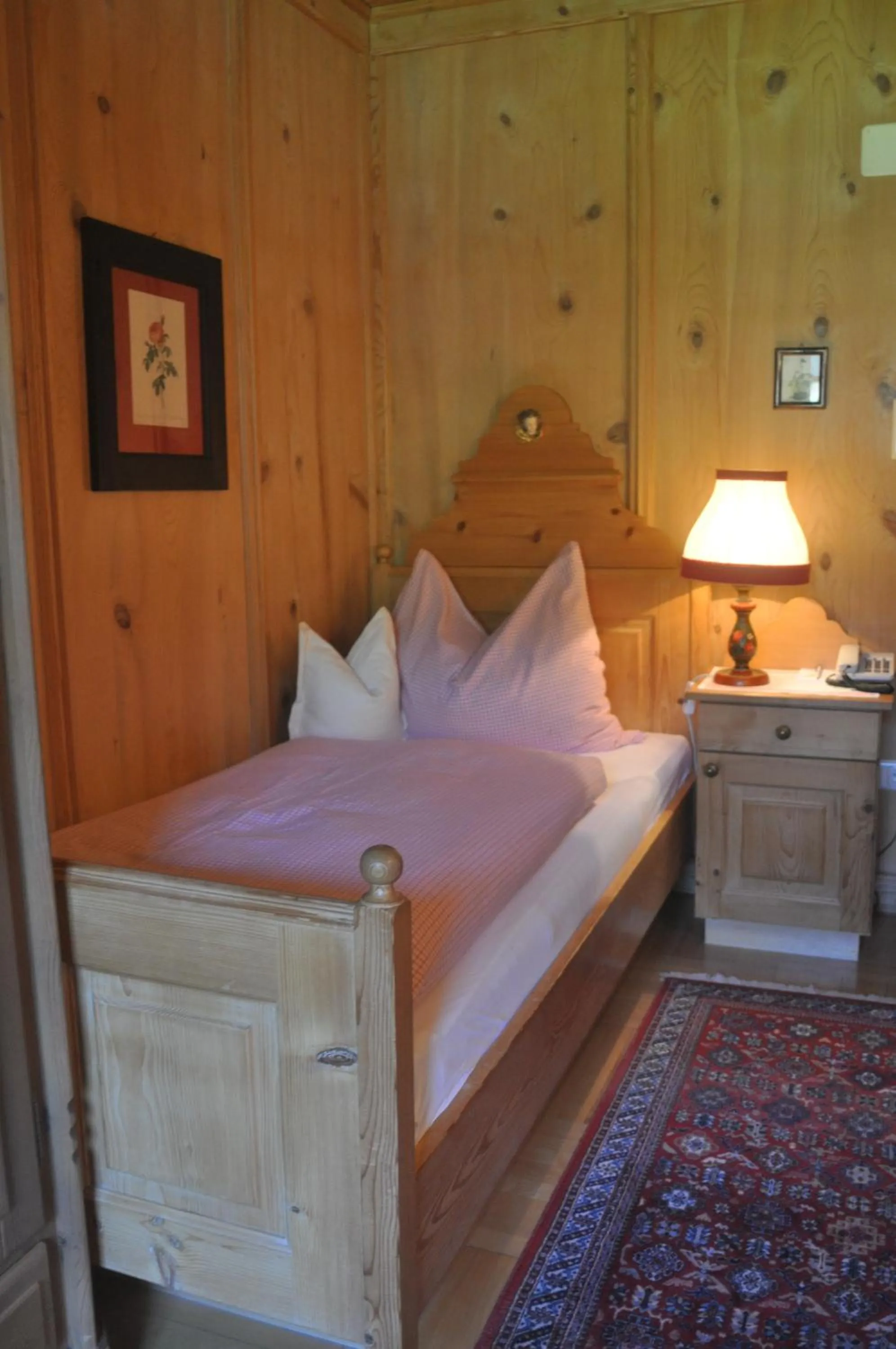 Bed in Romantikhotel Almtalhof