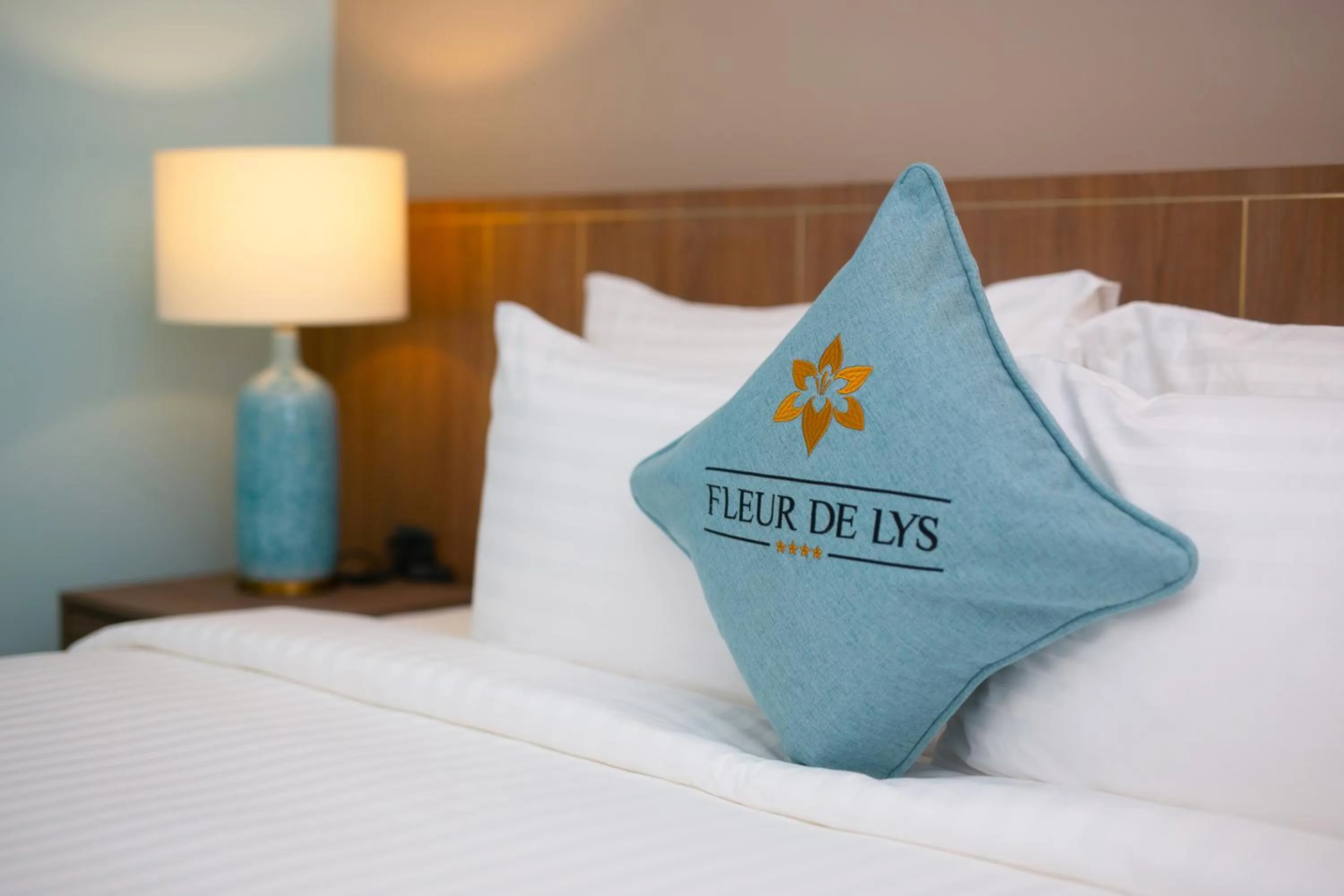 Bed in Fleur de Lys Hotel Quy Nhon