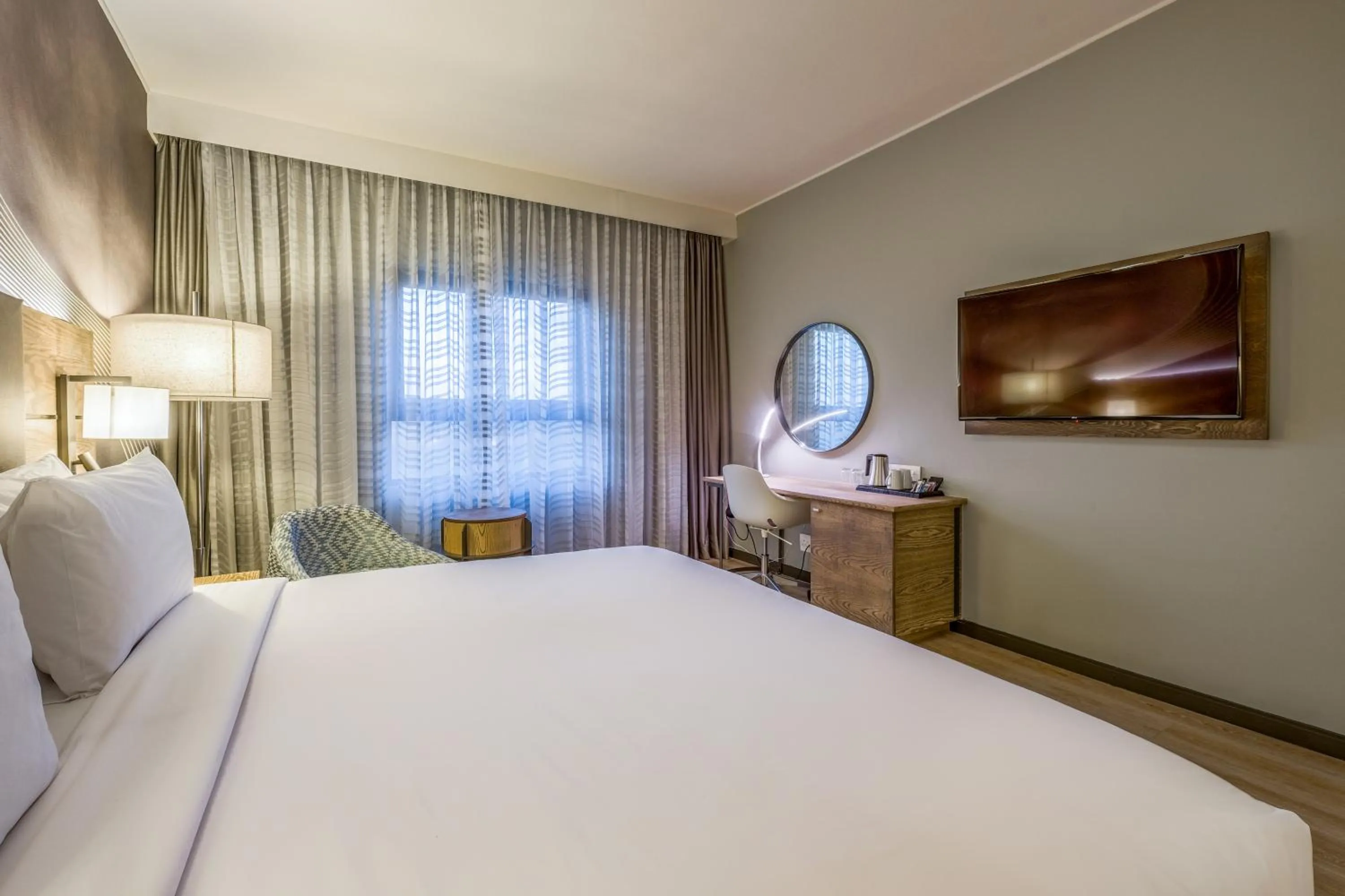 TV and multimedia, Bed in Radisson Hotel and Convention Centre OR Tambo Airport