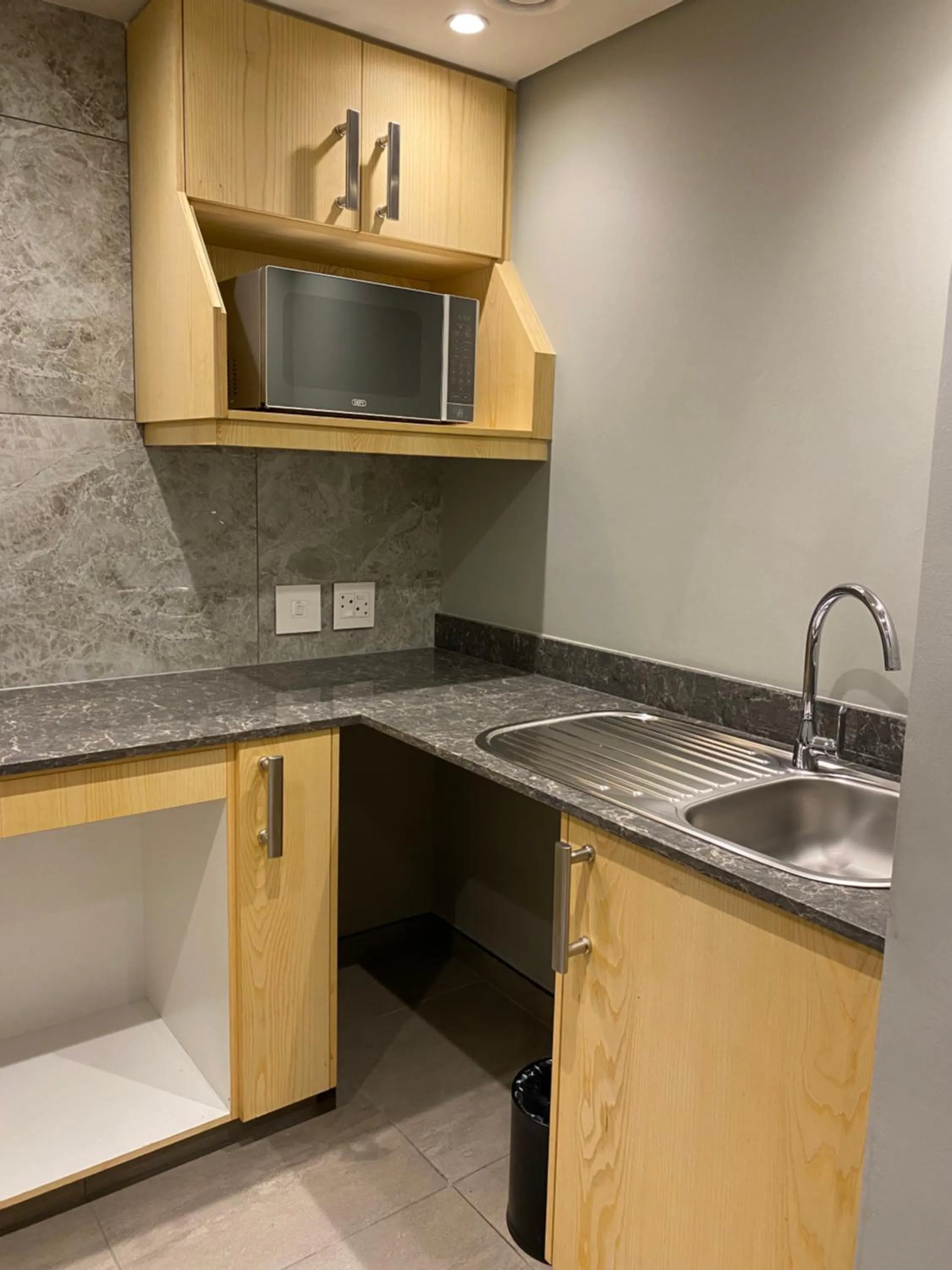 Kitchen or kitchenette in Radisson Hotel and Convention Centre OR Tambo Airport