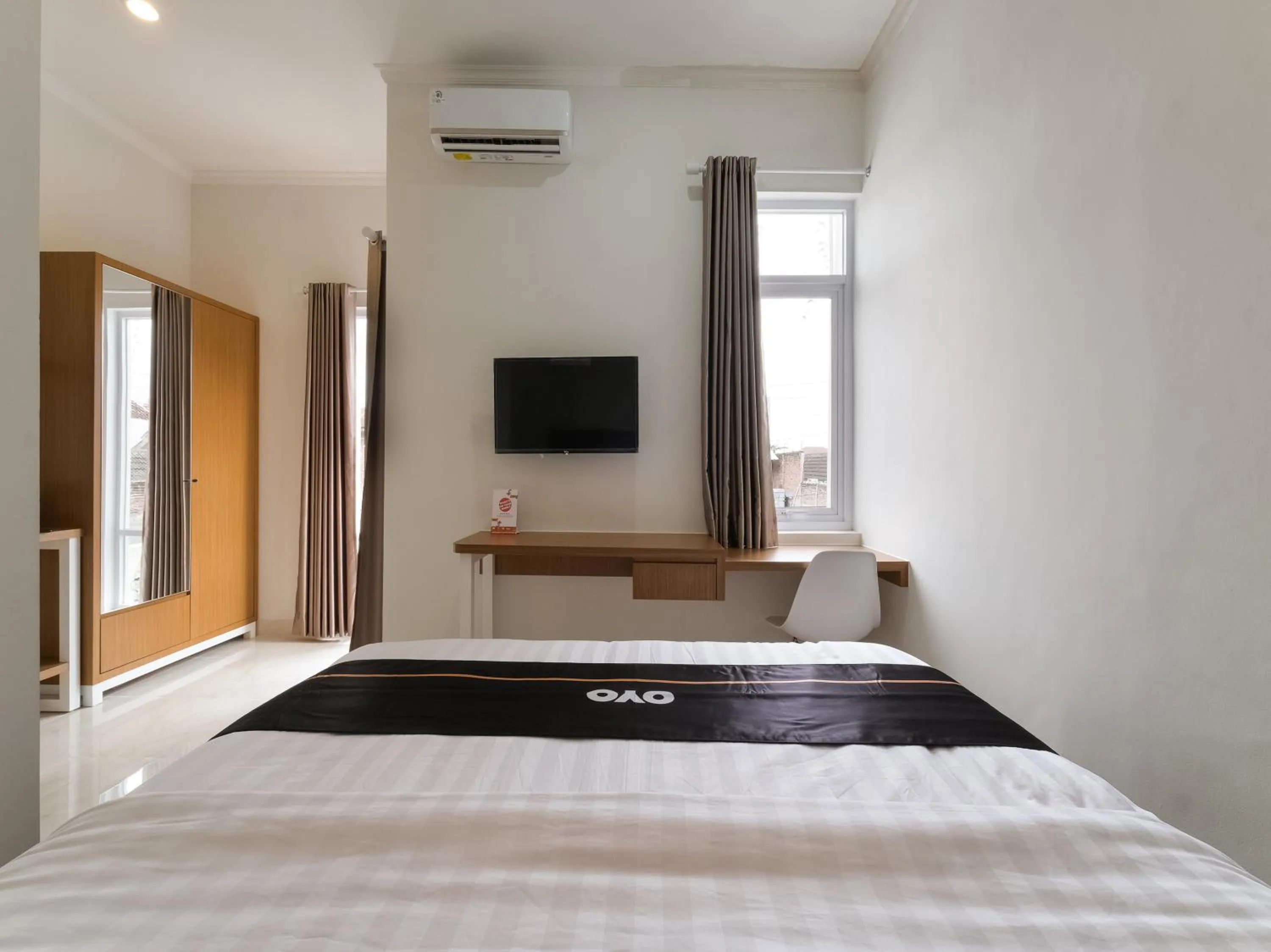 Bedroom in Super OYO Collection O 90023 Damar Kusumo Guest House