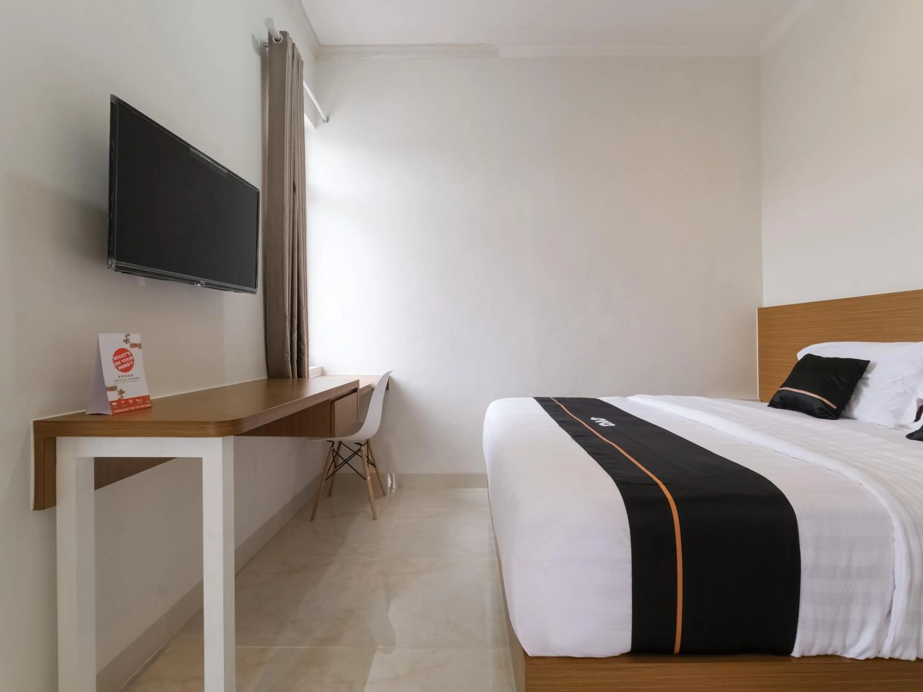 Bedroom in Super OYO Collection O 90023 Damar Kusumo Guest House