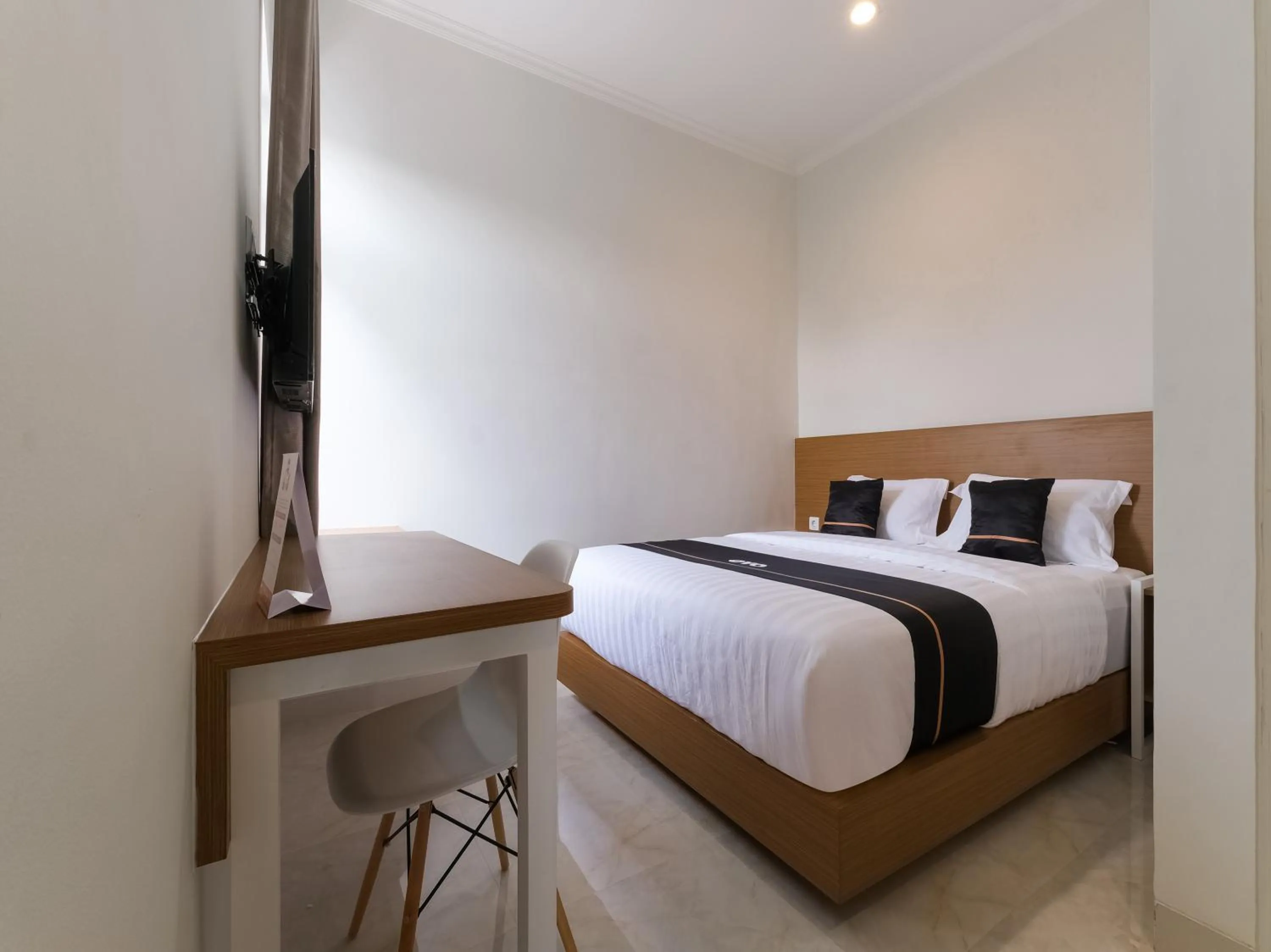 Bedroom in Super OYO Collection O 90023 Damar Kusumo Guest House