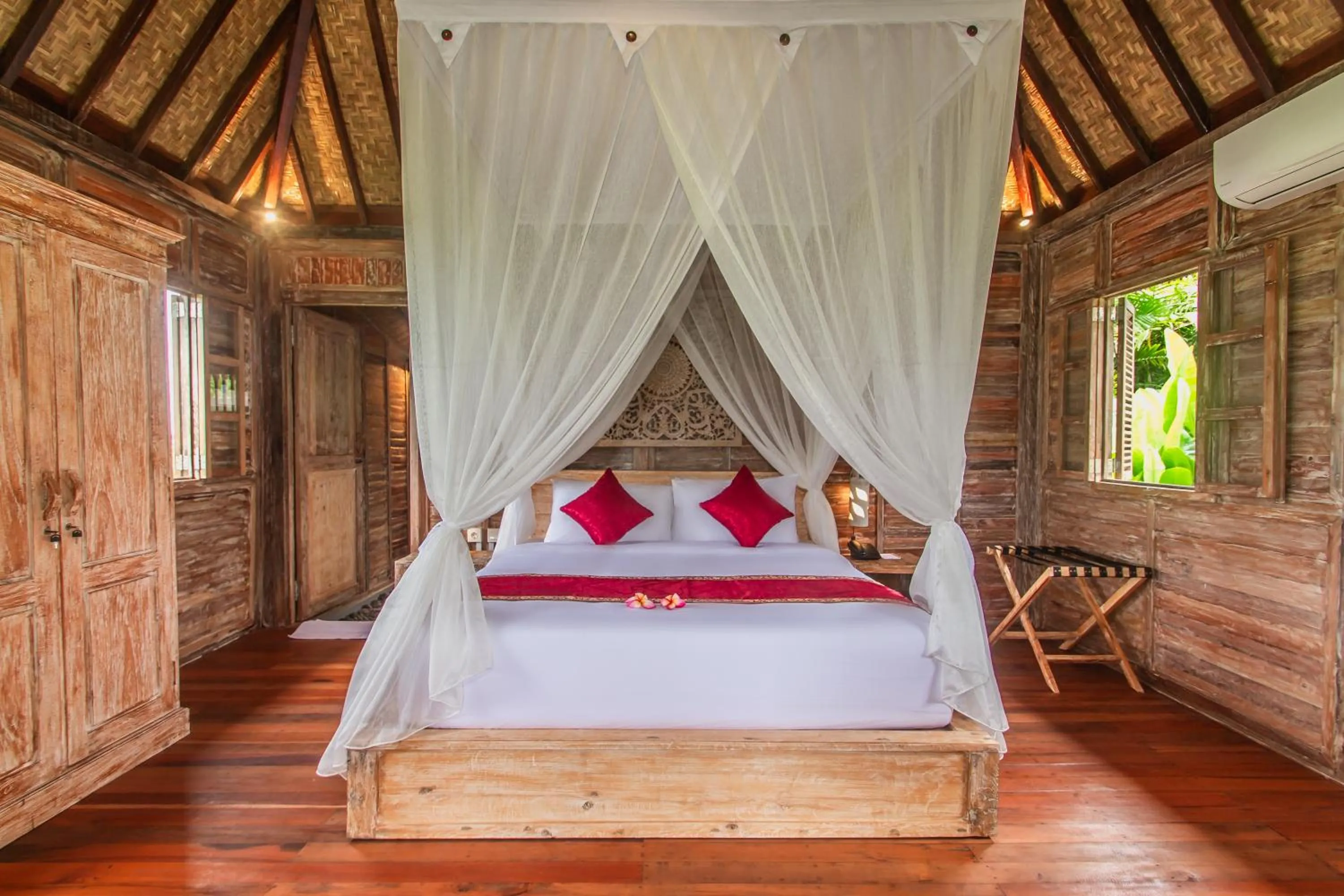 Bed in Aswanaya Villas Ubud