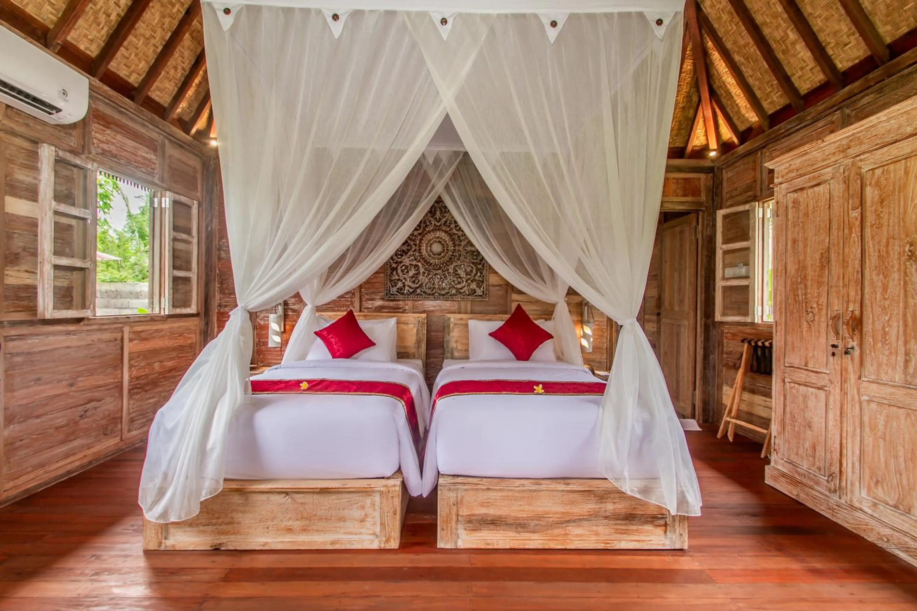 Bed in Aswanaya Villas Ubud