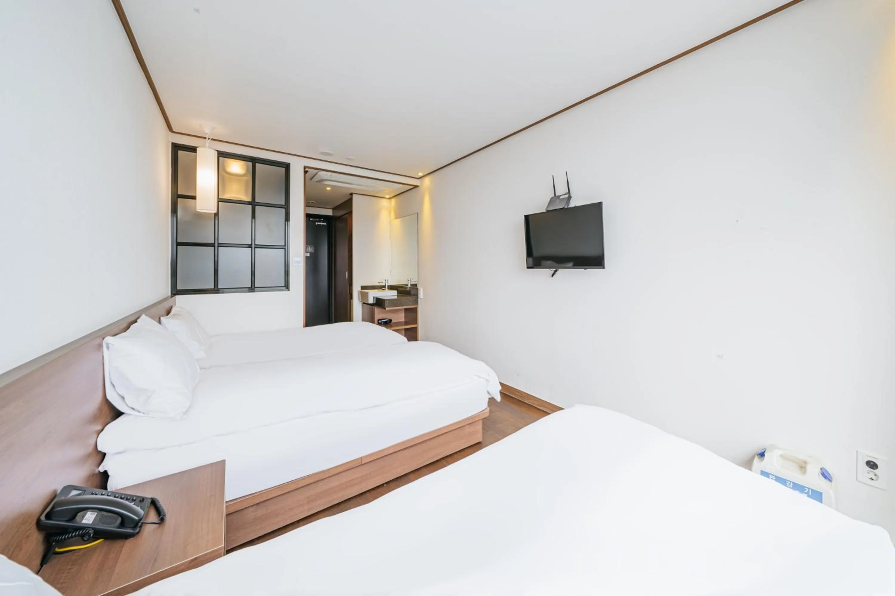 Bed in Tamara Jeju hotel