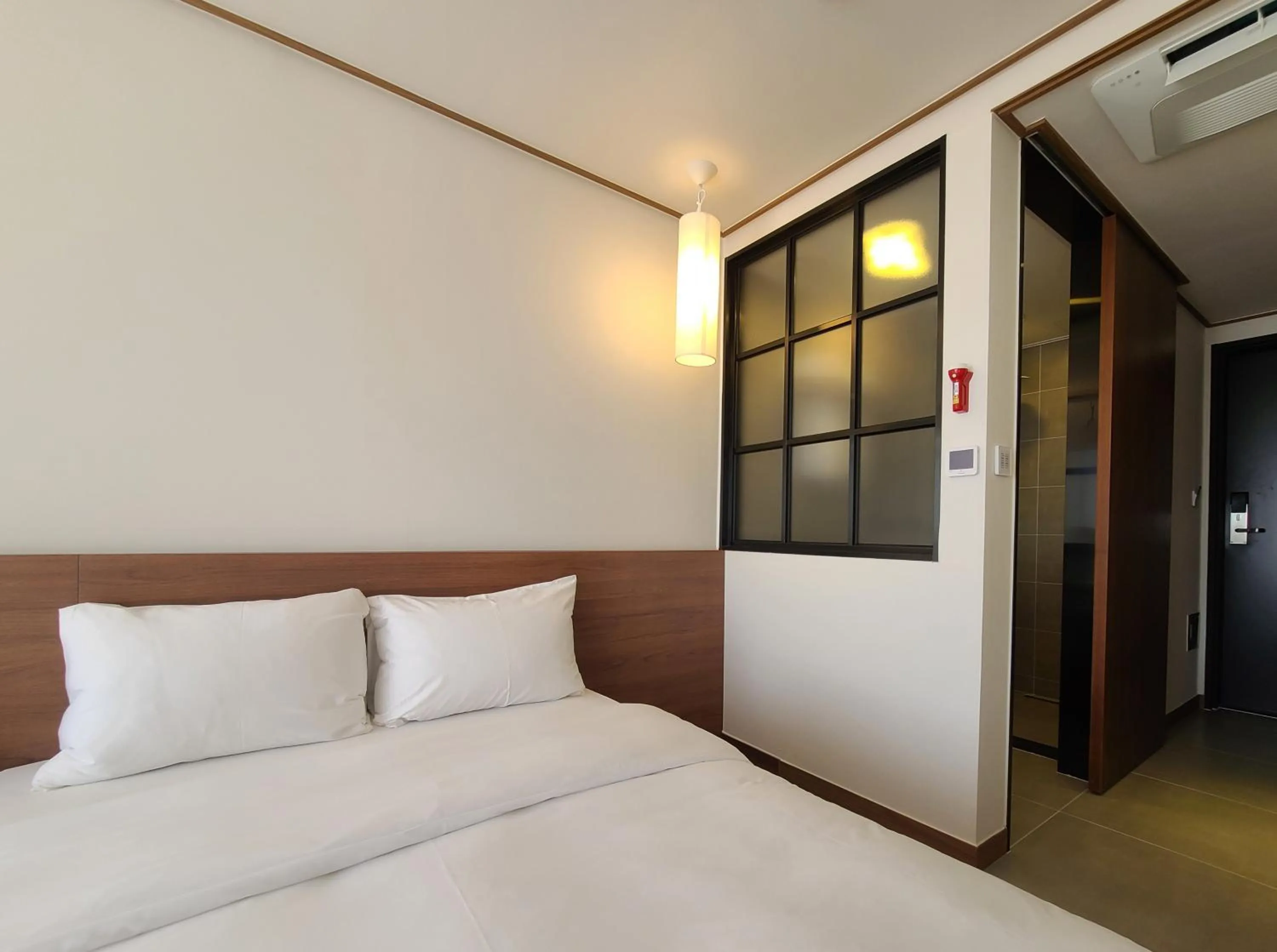 Bed in Tamara Jeju hotel