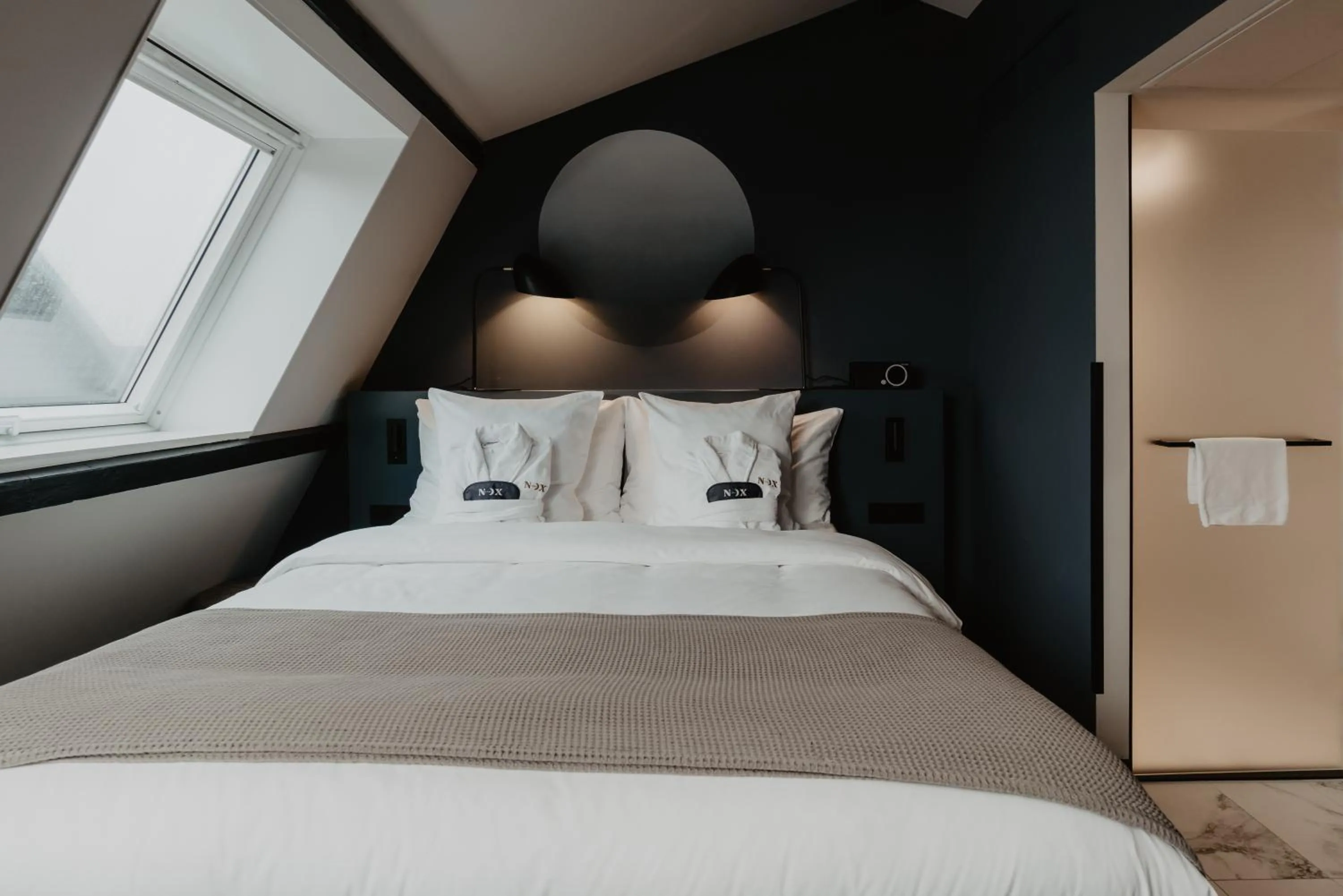 Bed in The Nox Hotel