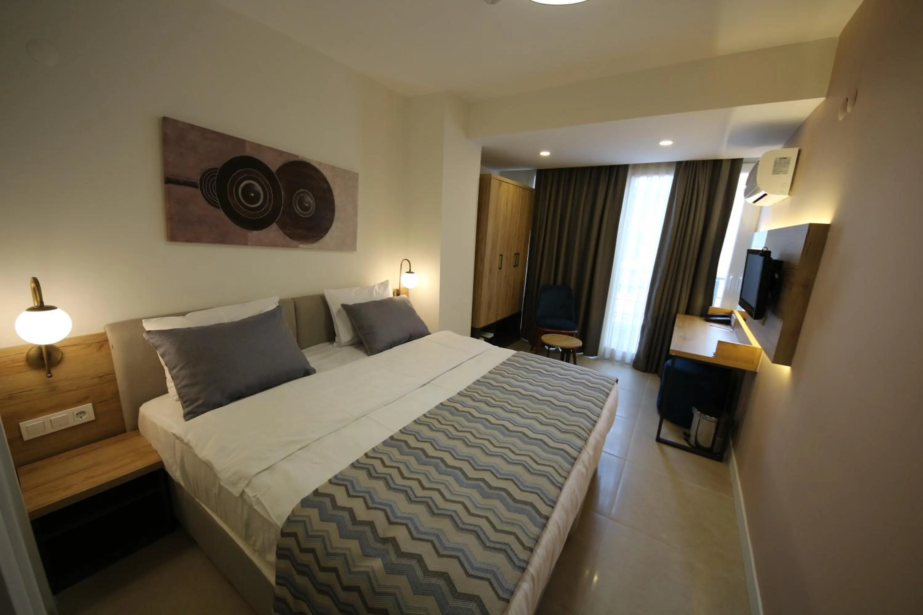 Bed in SPİLOS GÜMÜLDÜR HOTEL