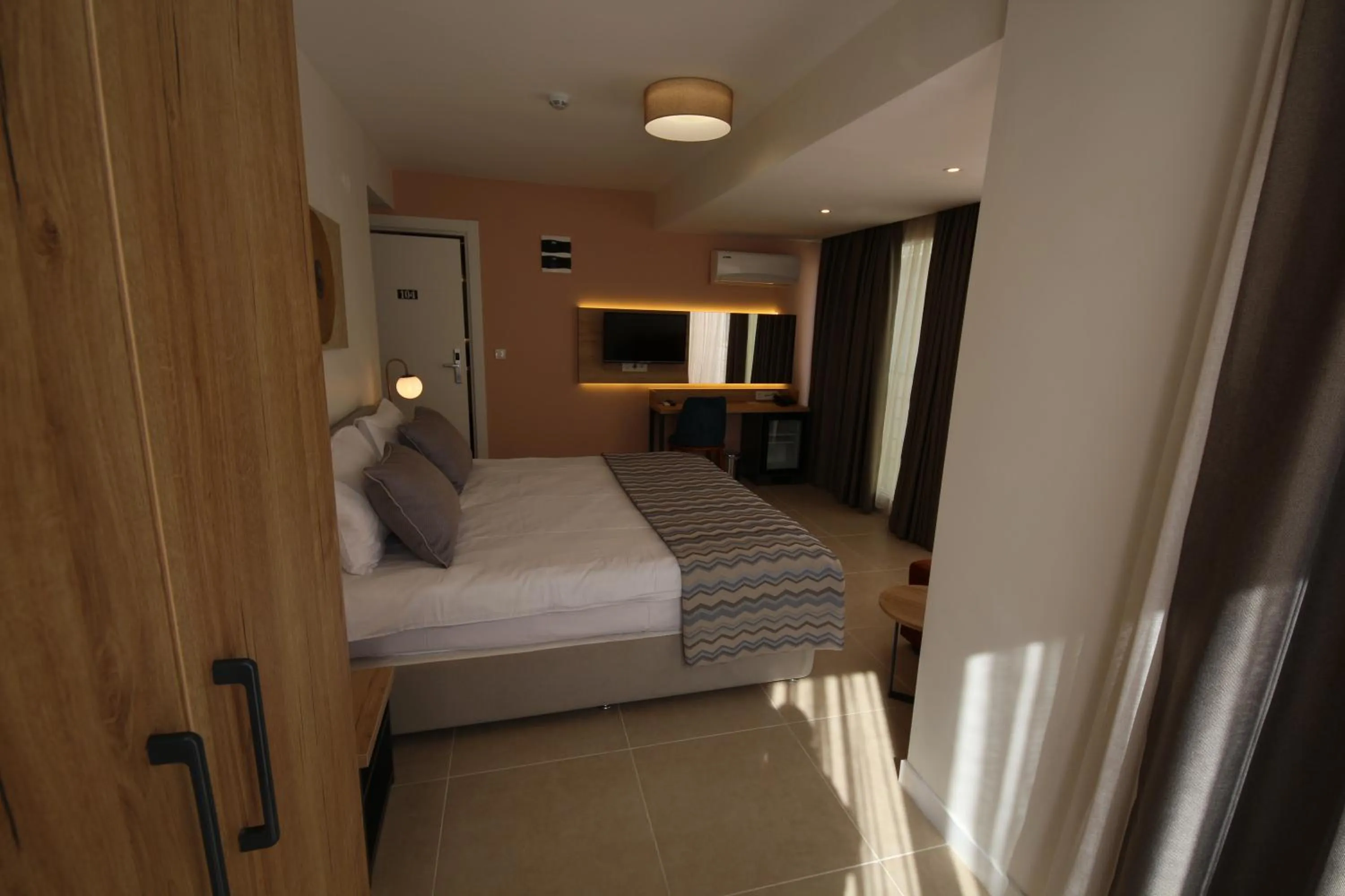 Bed in SPİLOS GÜMÜLDÜR HOTEL