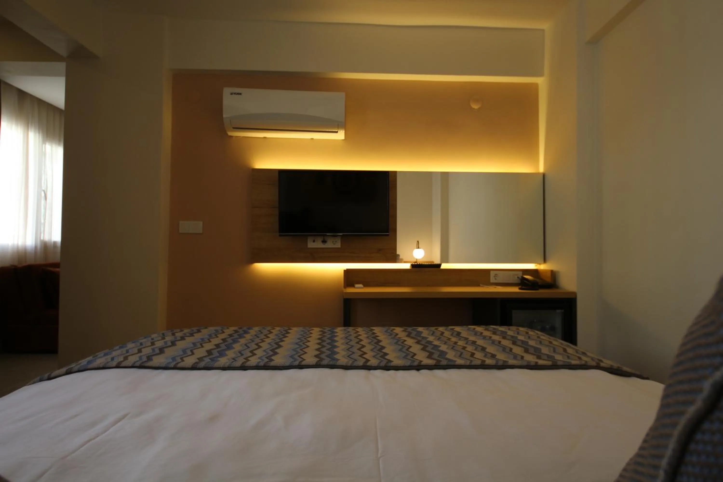 Bed in SPİLOS GÜMÜLDÜR HOTEL