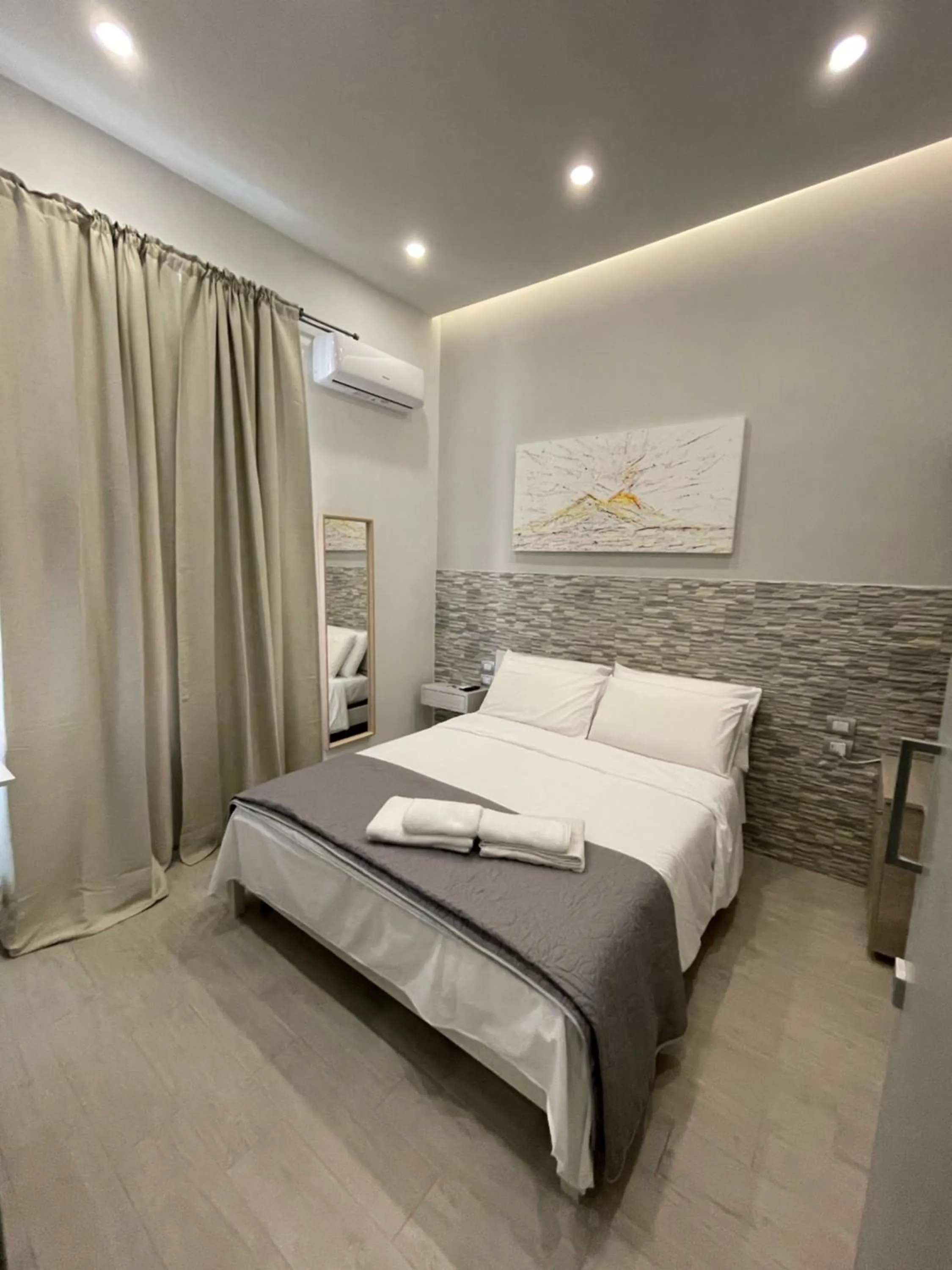 Bed in Naptown Rooms