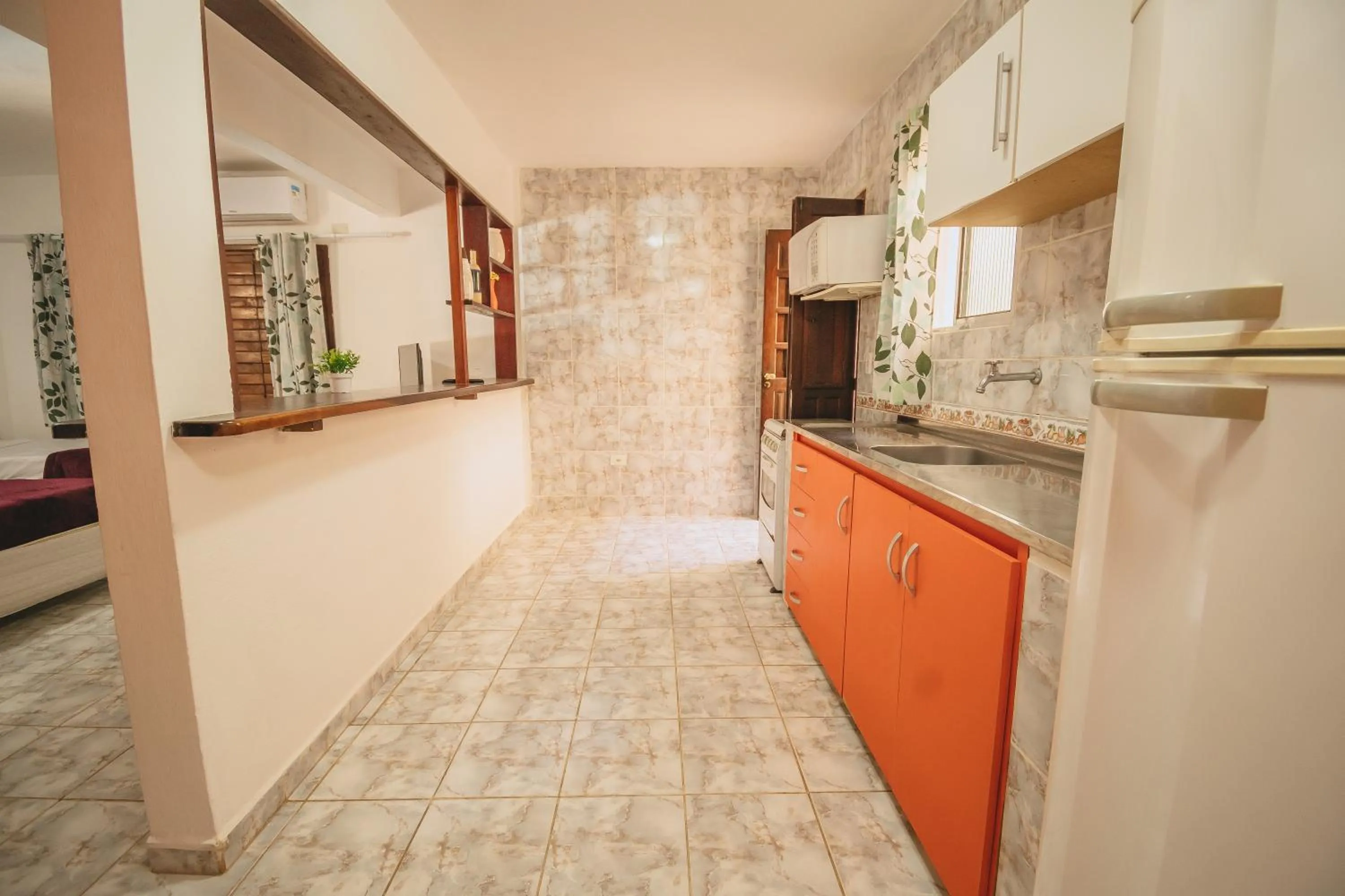 Kitchen or kitchenette in Pousada Porto Amazônia