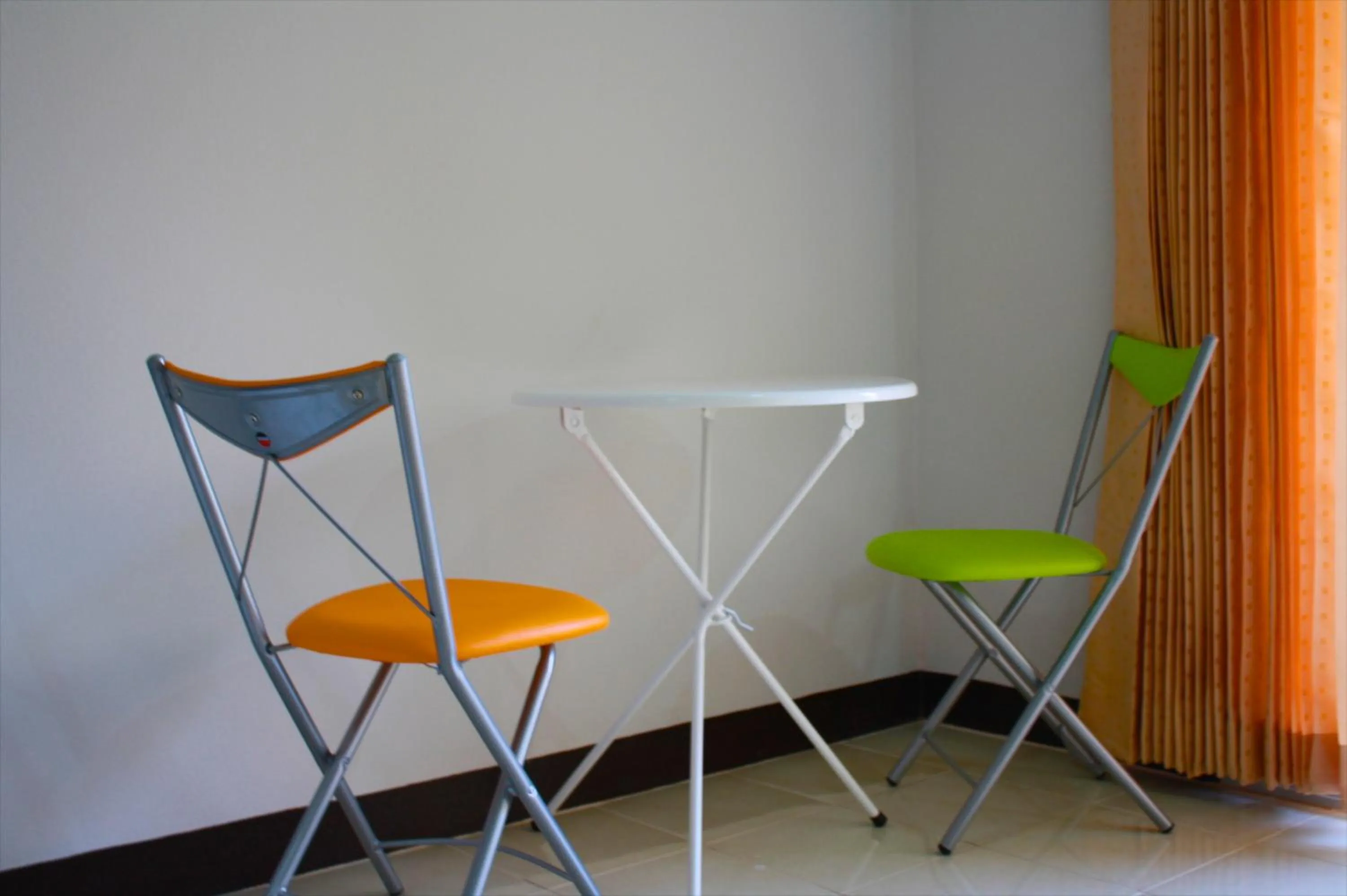 Seating area in Baanbudsarin Apartment