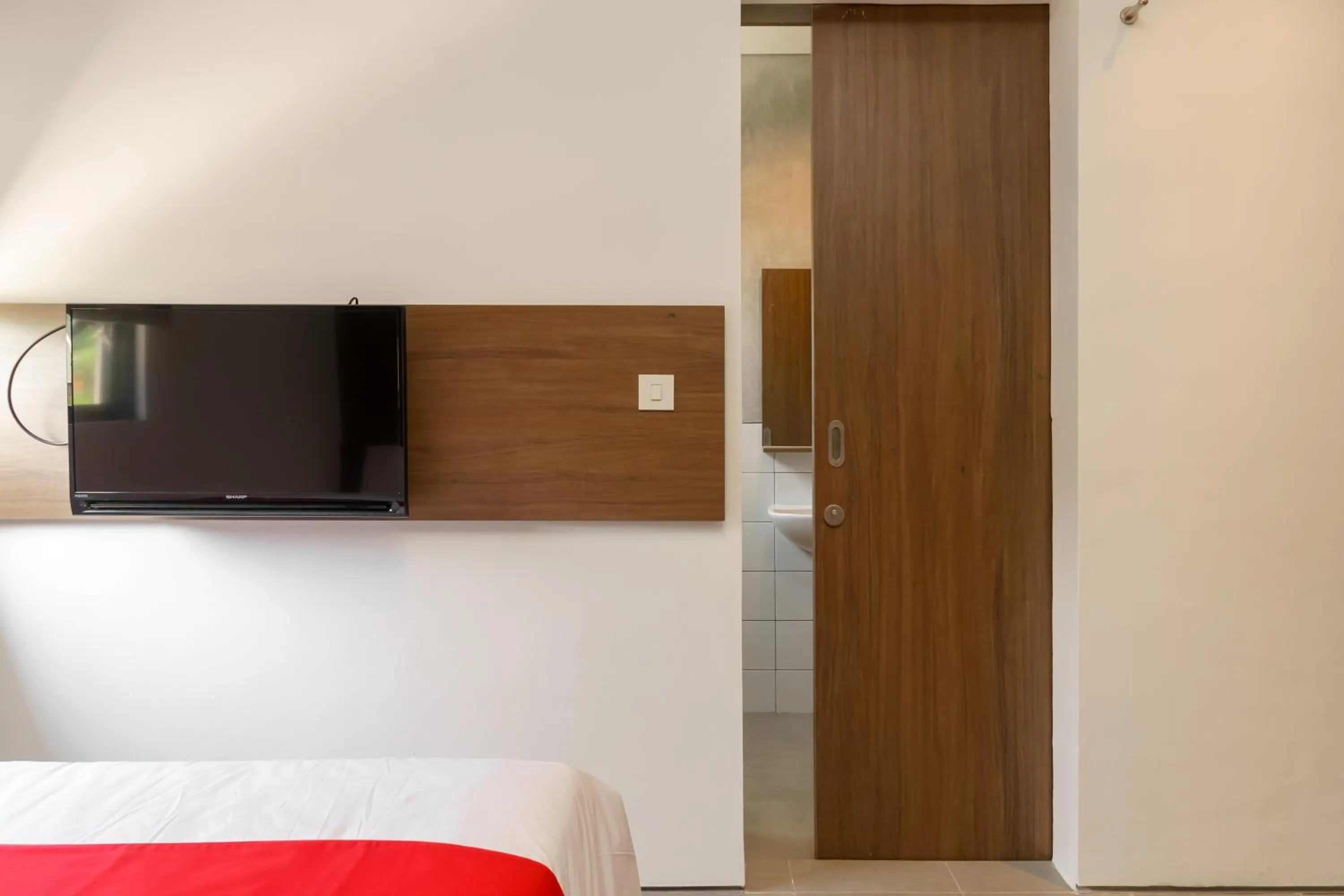 Bed in RedDoorz Syariah near Rumah Sakit Medika Dramaga