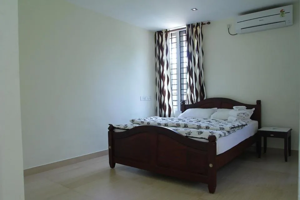 Bed in Fortbeach Service Apartments