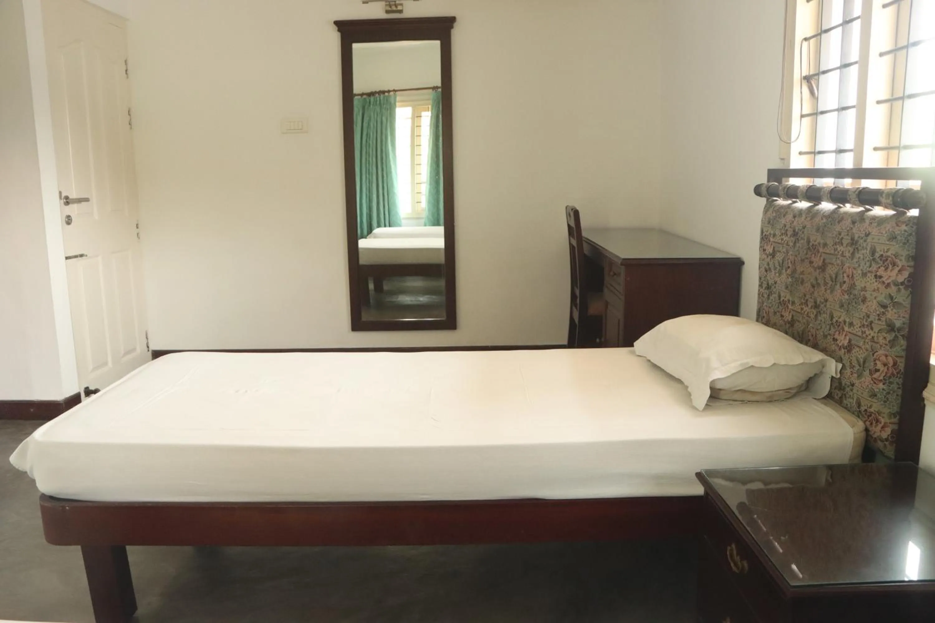 Bed in Fortbeach Service Apartments