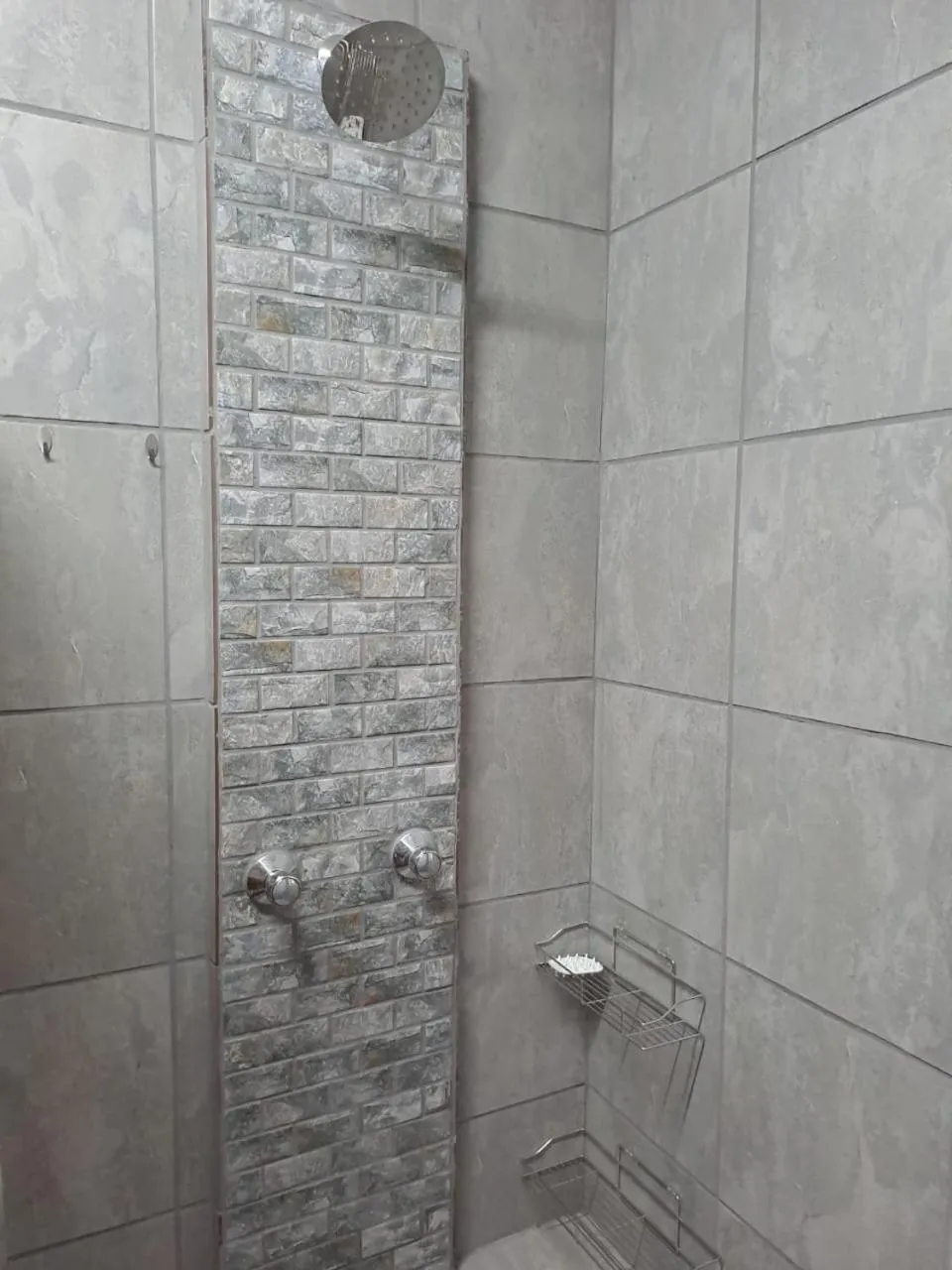 Shower in 24 Onvrey Guest House