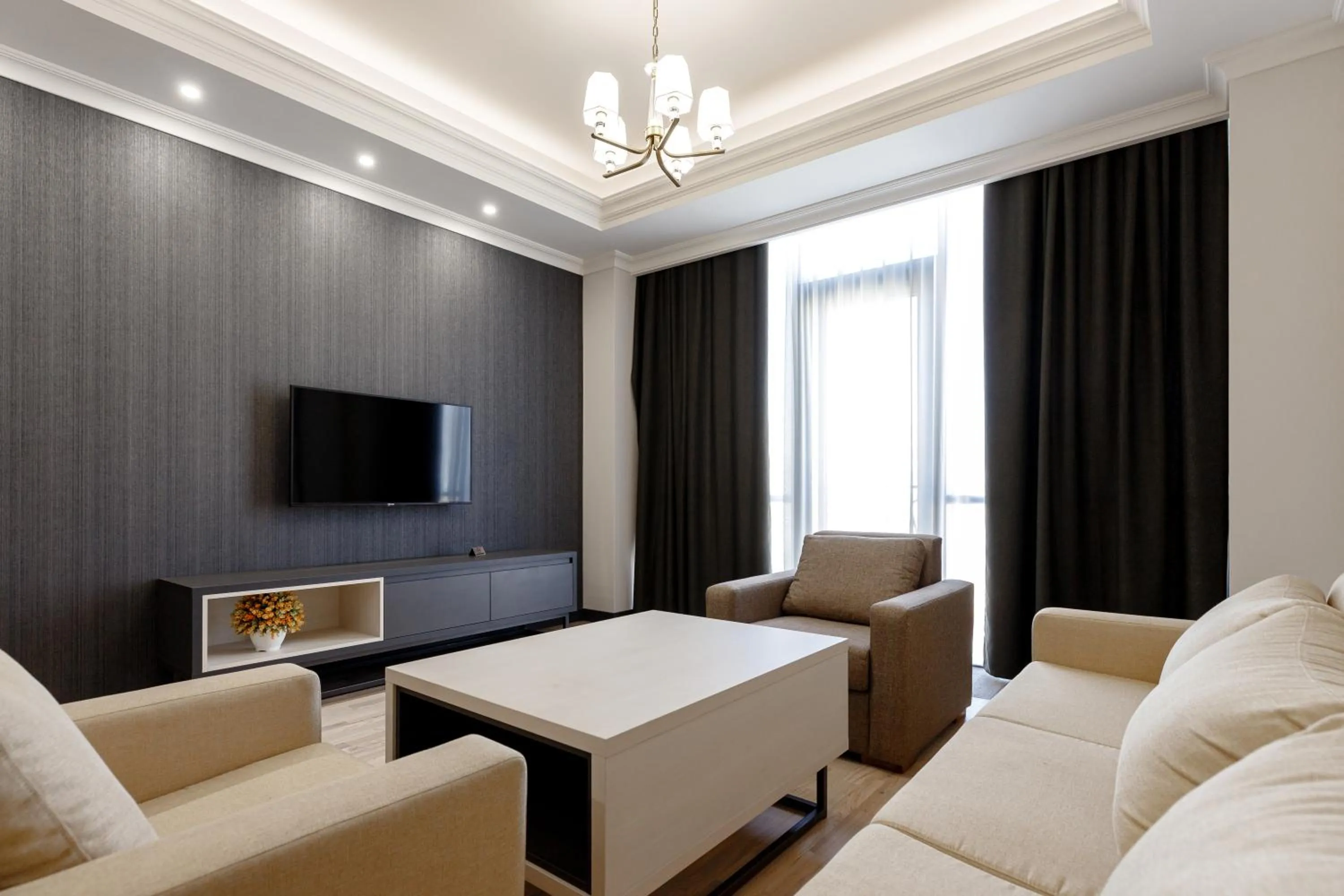 TV and multimedia in Hilltop North Avenue by Stellar Hotels, Yerevan